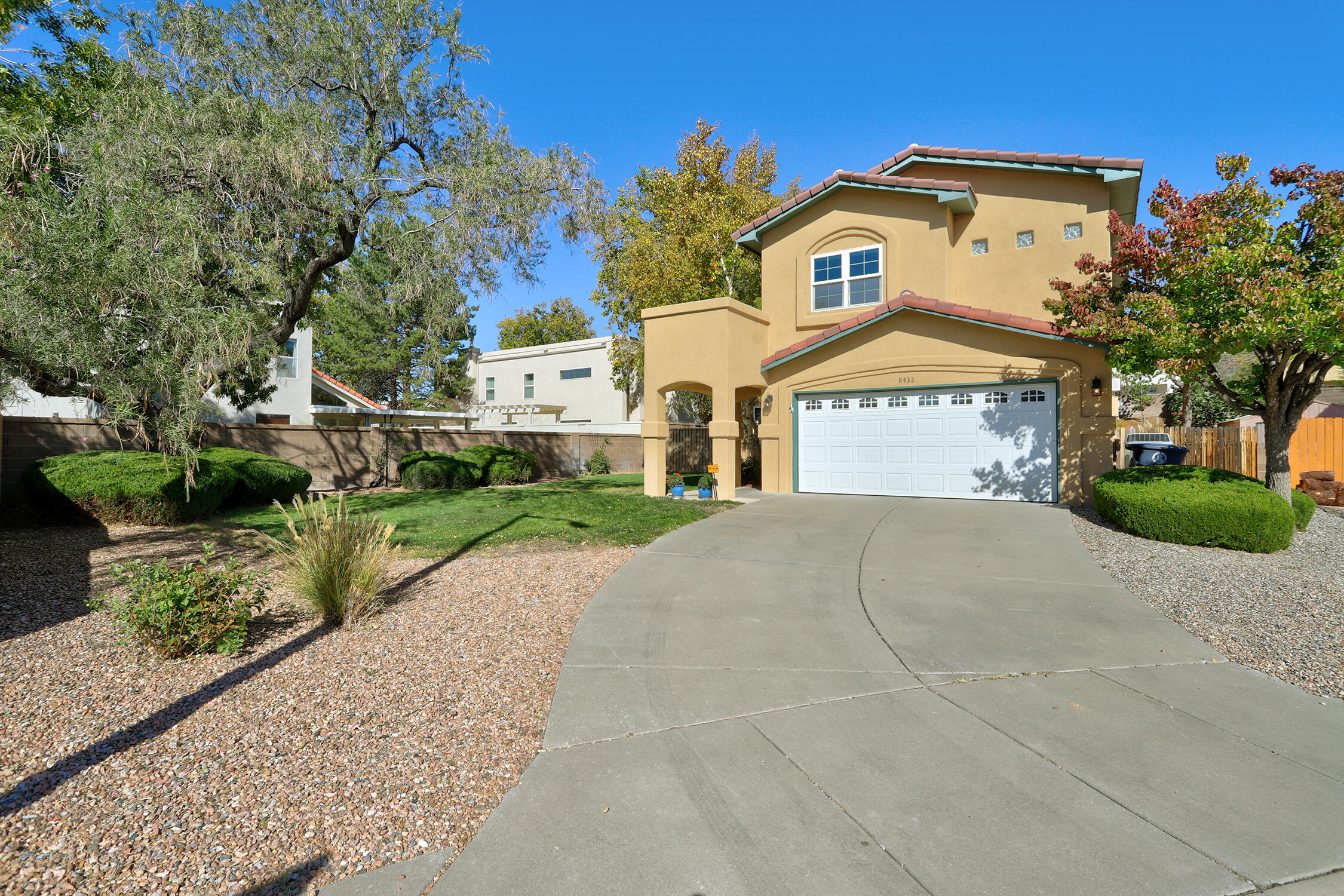 Stunning Home in Desirable Nor Este Manor in the far NE Heights. This updated 3 bedroom + loft & study, 4 baths home that seamlessly combines modern comfort with New Mexico charm. Within a welcoming neighborhood, this residence offers a perfect retreat for those seeking both convenience and tranquility as it's located in a culdsac. As you step inside, you'll be greeted by an open-concept living space featuring natural light, high ceilings, and tasteful finishes, The updated kitchen is a standout w/quartz countertops, custom cabinetry - ideal for both quiet dinners and entertaining. The primary suite includes a luxurious en-suite bath provides a private sanctuary.  All bedrooms have a private bath + a loft & study. Bedroom on main level.  Backyard access + a large beautiful grassy yard.