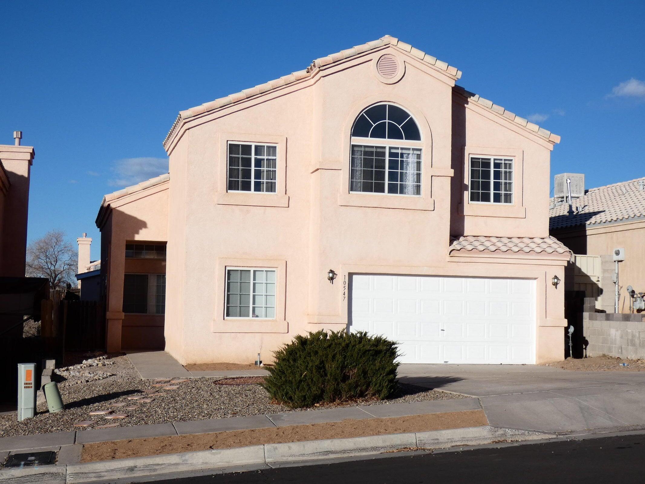 This beautifully updated home offers 5 bedrooms (one downstairs, perfect for an office), 2-car garage, tall ceilings, and refrigerated air. Enjoy a fresh look with new countertops, backsplash, two-tone paint, tile flooring, and carpet. The main suite boasts a garden tub, separate shower, and ample space. Step outside to a large backyard and a storage shed. Located near two hospitals, CNM Westside, and close to new Rio Rancho businesses and Cottonwood Mall, this home is a must-see!