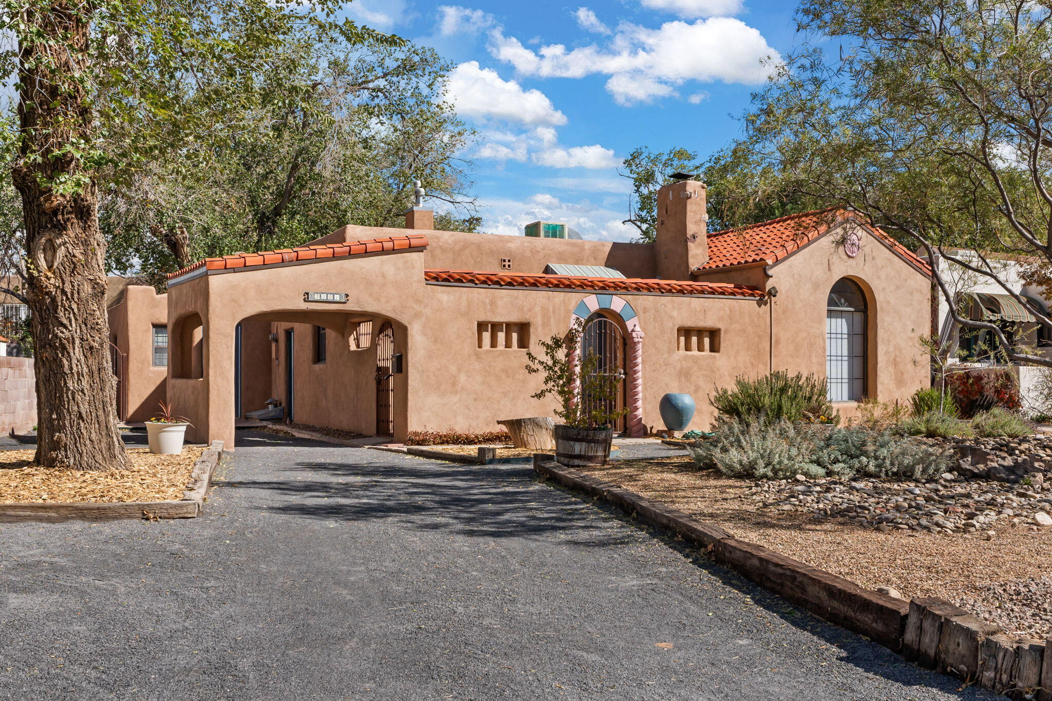 Discover a unique blend of history and modern convenience in ''Casa Bonita'' - a beautifully maintained historic home in the heart of Nob Hill, moments from UNM. Inviting and flexible 3 bedroom /  2 bathroom floor plan, the main home features 2 bedrooms and a full bath with original barrel cove ceilings in the living room, a rare architectural gem that elevates the property's charm. Updated 3rd bedroom or office/flex space features a 3/4 bath, mini-split hvac, luxury vinyl plank flooring, and new finishes throughout.  It's perfect for remote work, creative pursuits, or use as a guest suite. Private courtyard entry doubles as another outdoor living space - ideal for relaxation or entertaining. View more details in the Property Booklet! The embodiment of Nob Hill living, don't miss out!