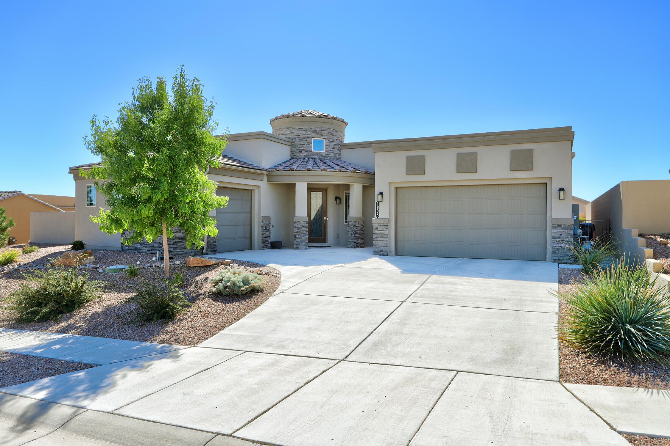 Nestled within the exclusive gated Mariposa community in Rio Rancho, NM, this luxurious 4-bedroom home offers the pinnacle of comfortable living. Designed with both style and convenience in mind, the open floor plan seamlessly connects the gourmet kitchen--featuring a built-in gas stove and sleek range hood--to a spacious living and dining area. Perfect for hosting or relaxing, the space extends effortlessly to a private outdoor oasis complete with a sparkling pool and soothing hot tub. With a dedicated office and countless modern upgrades, this move-in-ready home ensures both luxury and functionality. Don't miss the community center with two pools, full gym & yoga, zumba & pilate classes. Plus, neighborhood restaurant opening soon!