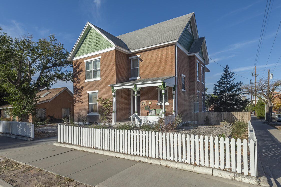 MAKE AM OFFER! Must see home, photos don't do it justice. Gorgeous two-story brick Victorian built in 1895, listed on both the National and New Mexico Historic Registry! Offering 4-6 bedrooms, 3 full baths, an extravagant entrance and grand staircase. Brand new dream kitchen with custom cabinets, white oak countertops, and high-end stainless appliances. No expense was spared on the restoration of this house, the original features were maintained while adding modern comfort and fixtures. With forced refrigerated air and heat, updated plumbing, and electrical. Beautiful updated bathrooms. Enjoy mountain and downtown views, refinished wood floors, tall ceilings, and large windows flooding rooms with light. Includes a one-car garage with driveway access.