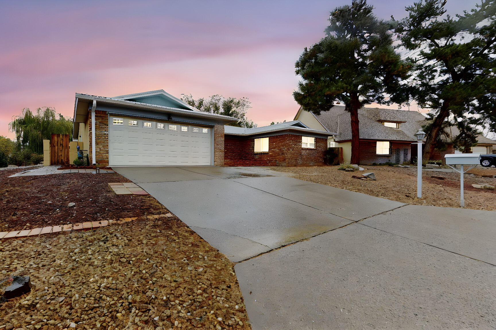 Lovely Corner lot Home in Holiday Park is ready for a new family.  This home includes Large living room with accent tile floors, light and bright separage Formal Dining Room.  Spacious Chefs Delight Kitchen with Stainless Steel Applicances, Plenty of cabinets and counter space plus a pantry. Enjoy the Family Room and the Cozy Warm Fireplace as the nghts get Chilly!  The Owners Suite has Large walk in closet and bath area. 2 other bedrooms as welll.  Outside Covered Patio and Soak in the Hot Tub as you look at the stars.  Close to many amenites and jogging/walking paths.  Come see this home todaty!!