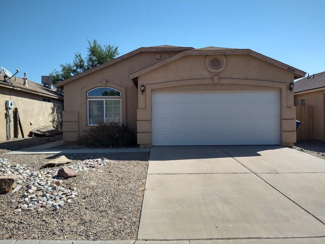 Move in Ready! This home boasts plant ledges, nicho's, 3 bedrooms, 2 possible living areas with a finished 2-car garage.  Easy access to Albuq and Rio Rancho.  Located in the growing area of Unser Blvd and McMcMahan.  Breweries, New Restaurants, and so much more are just blocks away.  The landscaping is easy maintenance.