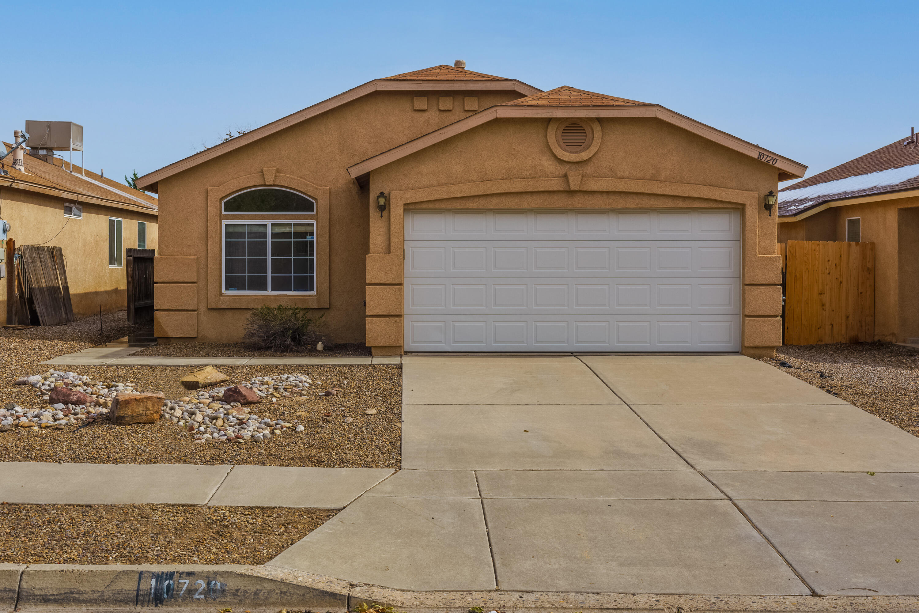 Move in Ready! This home boasts plant ledges, nicho's, 3 bedrooms, 2 possible living areas with a finished 2-car garage.  Easy access to Albuq and Rio Rancho.  Located in the growing area of Unser Blvd and McMcMahan.  Breweries, New Restaurants, and so much more are just blocks away.  The landscaping is easy maintenance.