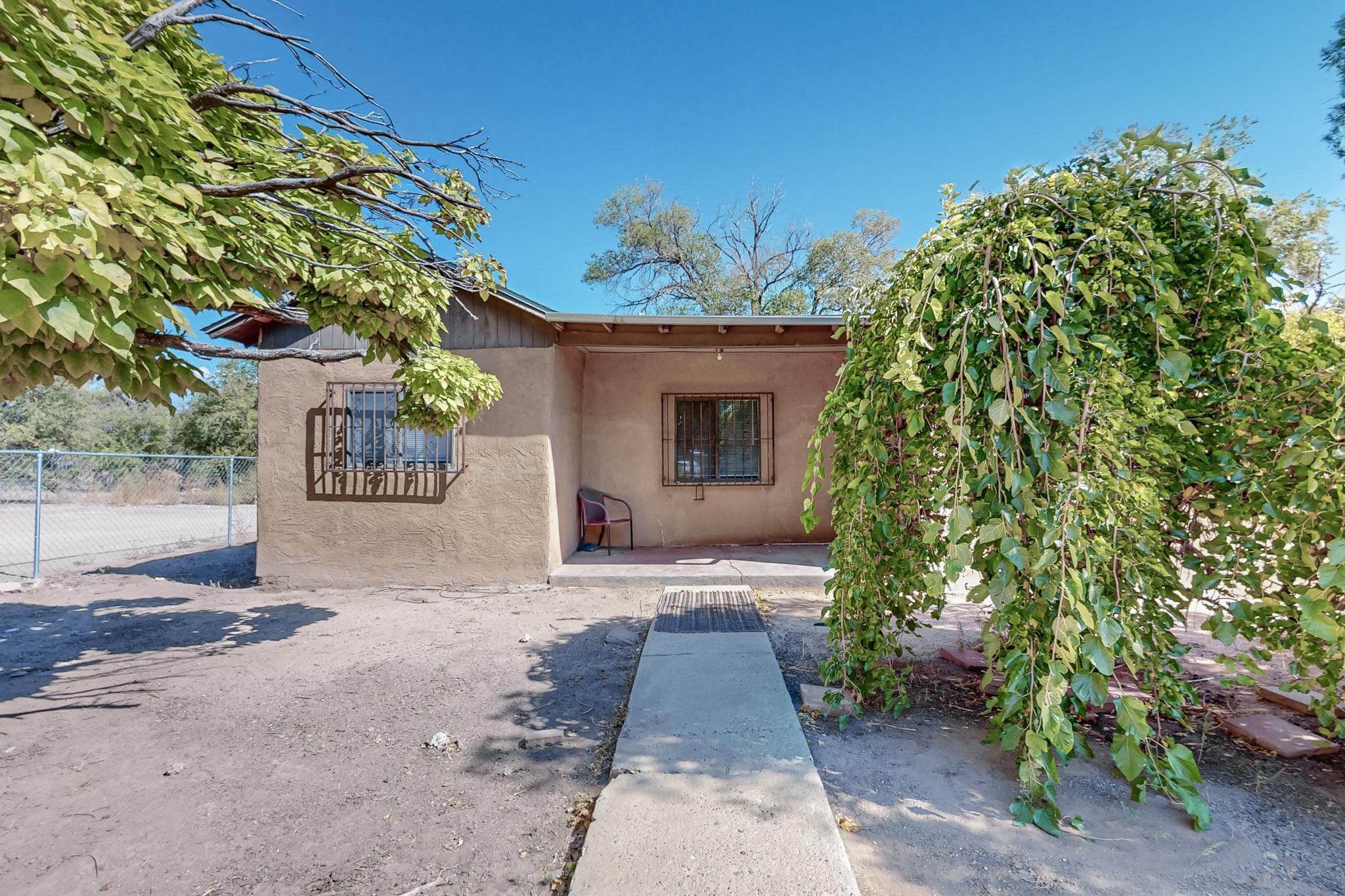 Take a look at this unique property, located in the Albuquerque's South Valley, just steps from Rio Grande and ditch. 2 Bedroom, 1 Bathroom and carport.Schedule your showing today!!