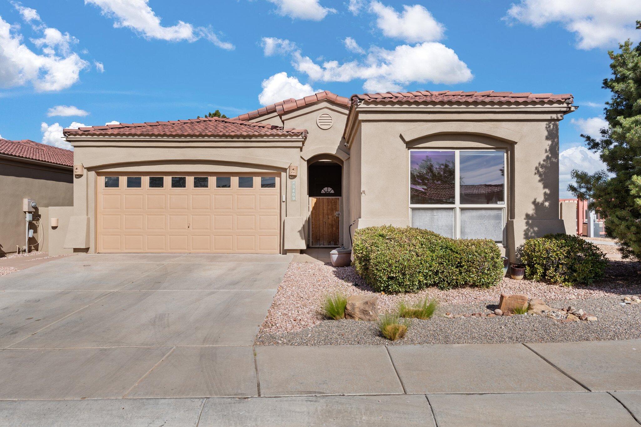 This exquisite Charter-built home, located on a prime corner lot in the exclusive gated Enclave at Oxbow, offers refined living at its best. The open, single-level floor plan is complemented by a luxurious separate guest casita with a full bath--ideal for an extended family member, teen, or as an elegant home office or creative space. Inside you'll find designer metallic epoxy flooring, tile, a cozy fireplace, a dining area, stainless steel appliances, large primary bedroom with double sinks, refrigerated air, variance finished walls and more. Also the property boasts a beautifully landscaped, low-maintenance yard with a serene, tree-lined patio and a tranquil fountain, all enclosed for ultimate privacy, and a permitted storage shed, approved by the HOA. You don't want to miss this one!