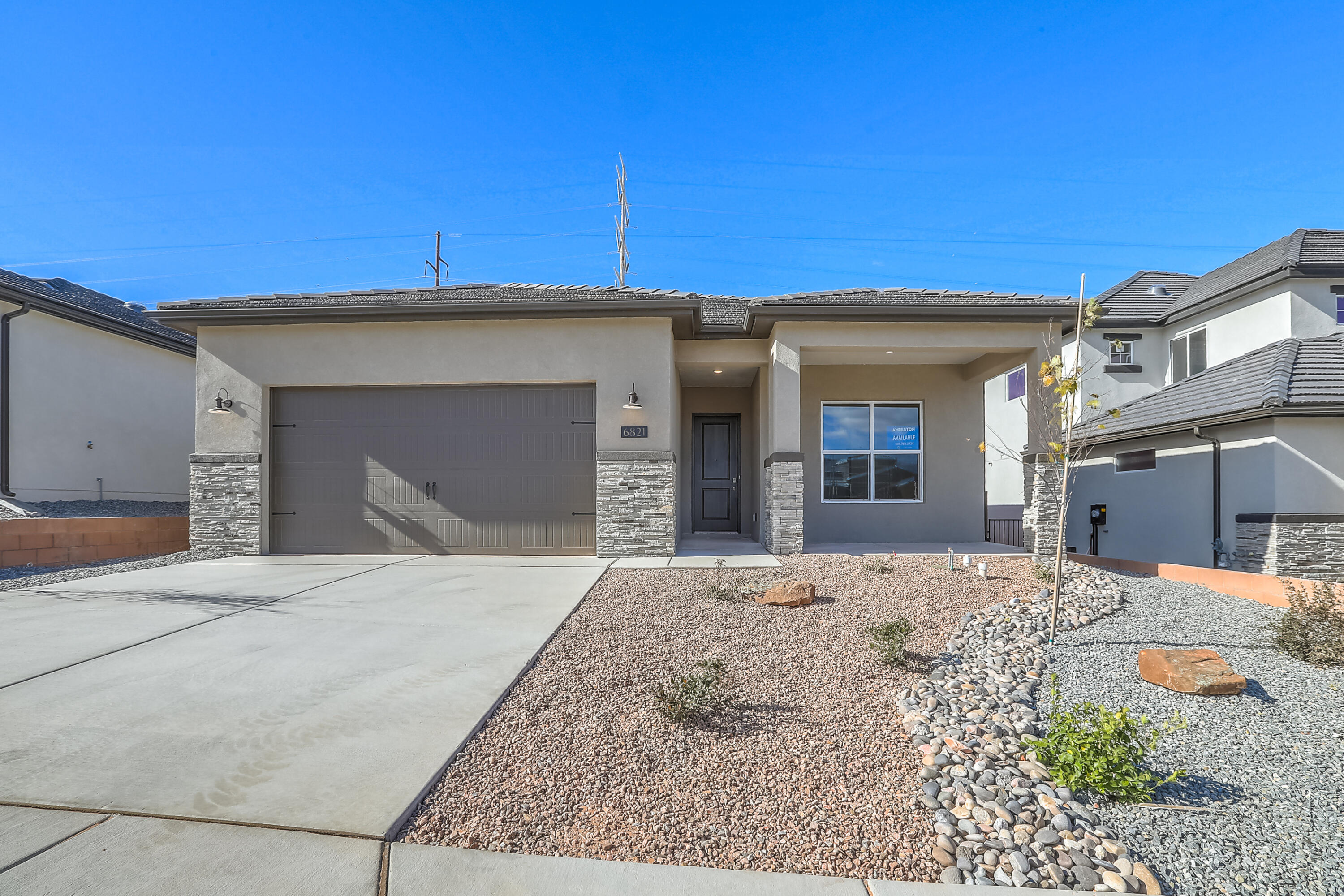 Discover this beautifully designed 1,918 sq ft home built in 2022 featuring three spacious bedrooms and three baths. Enjoy your mornings on the inviting covered front porch, and cook up a storm in the large kitchen equipped with a center island, stainless granite counter tops, maple cabinets, stainless steel appliances, and a massive walk-in pantry--perfect for all your culinary needs.Step outside to a covered patio, ideal for entertaining or relaxing, all surrounded by lush, fully landscaped grounds. Located just a stone's throw away from community parks and offering quick access to NM Hwy 550, this home combines convenience with comfort.Don't miss out on this gem--schedule your viewing today!