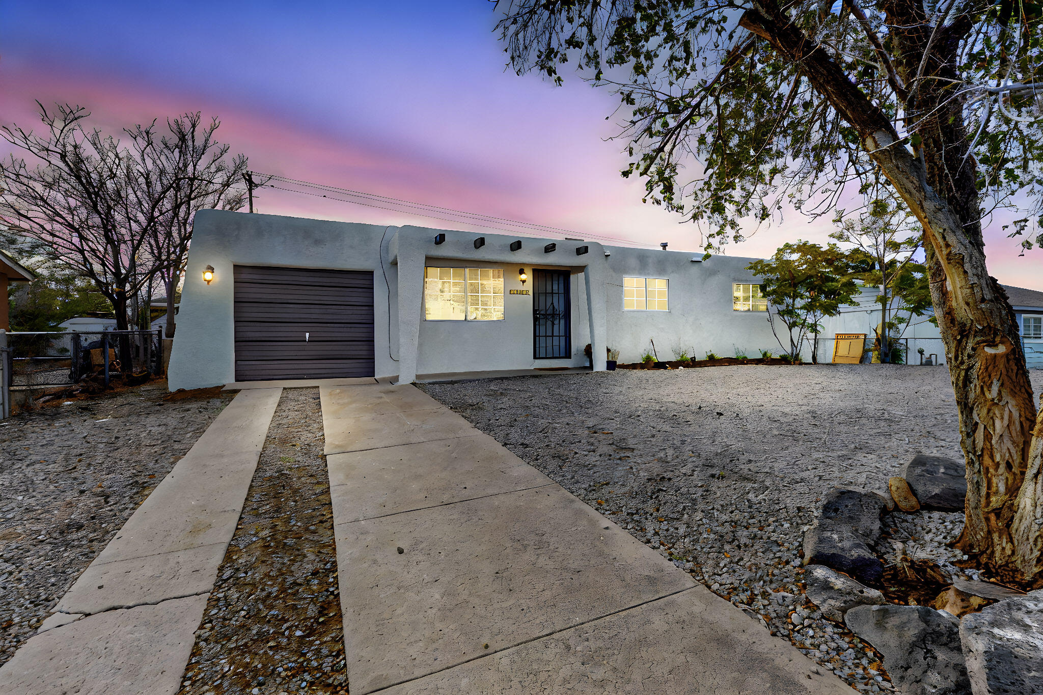 Charming and sophisticated! Newly remodeled home located in a sought-after Northwest Albuquerque neighborhood, offering comfort, convenience, and great potential. With its open layout, this home is perfect for both relaxed living and entertaining. The spacious kitchen and cozy living room provides a welcoming atmosphere, while a large backyard offers plenty of space for outdoor activities. This home also features a one-car garage providing space for storage/parking. You'll enjoy easy access to shops, restaurants, parks, schools, and more! This home combines a great location with inviting living spaces. Don't miss the chance to make it your own- schedule a tour today!