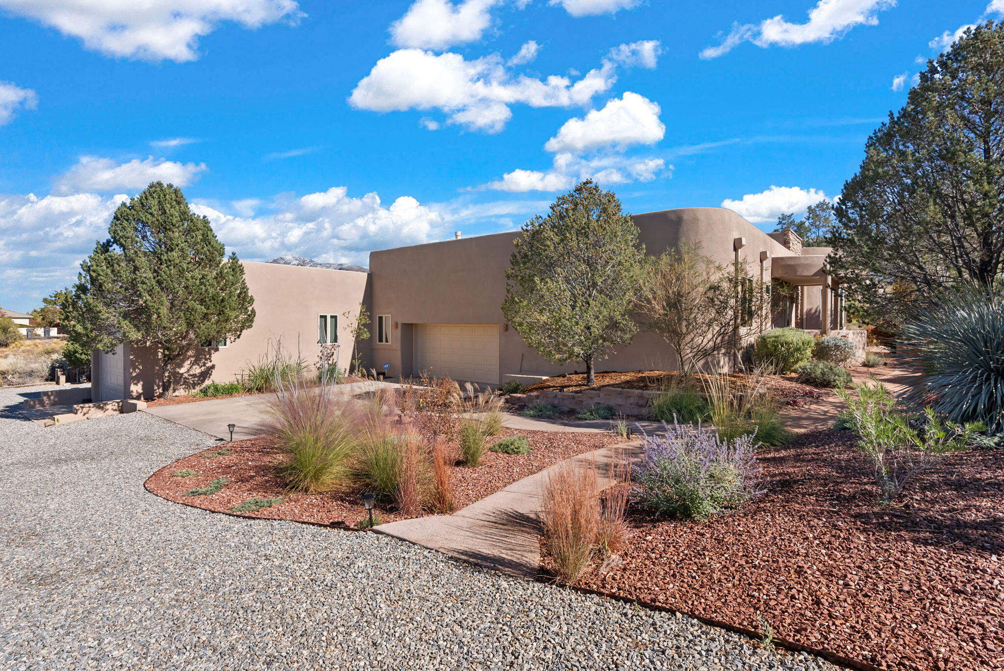 Single-Story home situated on 1.63 acre lot on Elena Dr. in North ABQ Acres. Step into this beautifully reimagined home where every detail has been thoughtfully upgraded from top to bottom. Seamlessly blending modern sophistication with organic finishes, this home exudes warm, but contemporary charm. The heart of the home features a spacious, chef-inspired kitchen adorned with high-end appliances, custom cabinetry and Dekton counters, flowing effortlessly into the living and dining areas. Natural light floods the entire home through skylights and recently installed Pella windows throughout allowing the views to truly be captivated. Retreat into the luxurious, spa-like primary suite, privately situated apart from the other bedrooms for ultimate serenity.