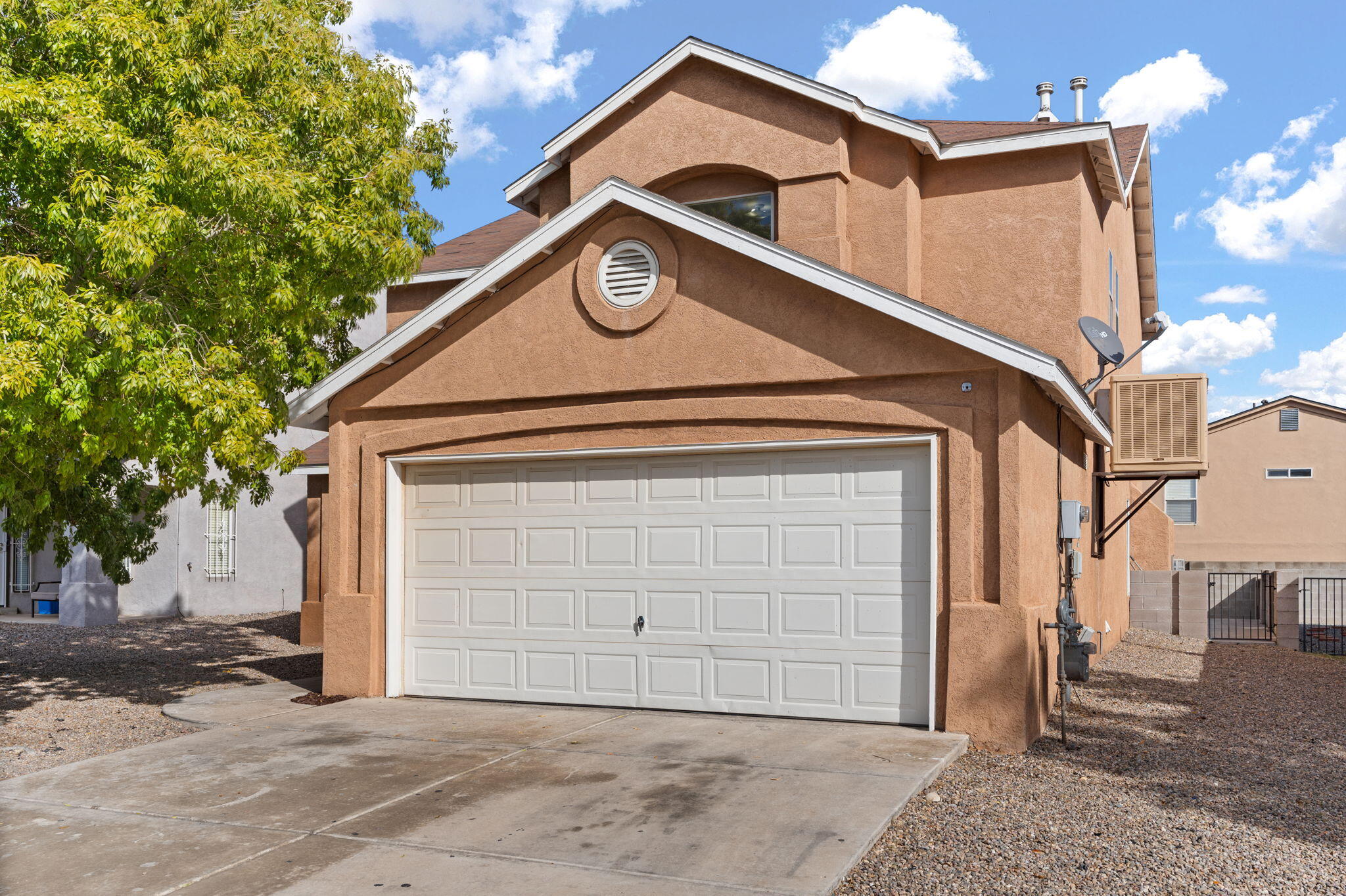 Welcome to this spacious residence that offers a newly painted white interior and new carpet, leaving you with a fresh feel and giving it a bright airy presence. As you step through the front door, you're greeted by an open and inviting foyer that leads into the expansive living areas. The living room is bathed in natural light, with large windows offering views of the backyard. The heart of the home is the kitchen that is right off the living room. It features a long bar top, plenty of cabinet space, and a pantry for all your culinary needs. The adjacent dining area offers plenty of room for family meals or entertaining guests. Upstairs, the primary suite is a true retreat. It boasts a generous layout, complete with a walk-in closet and a luxurious en-suite bathroom featuring a soaking