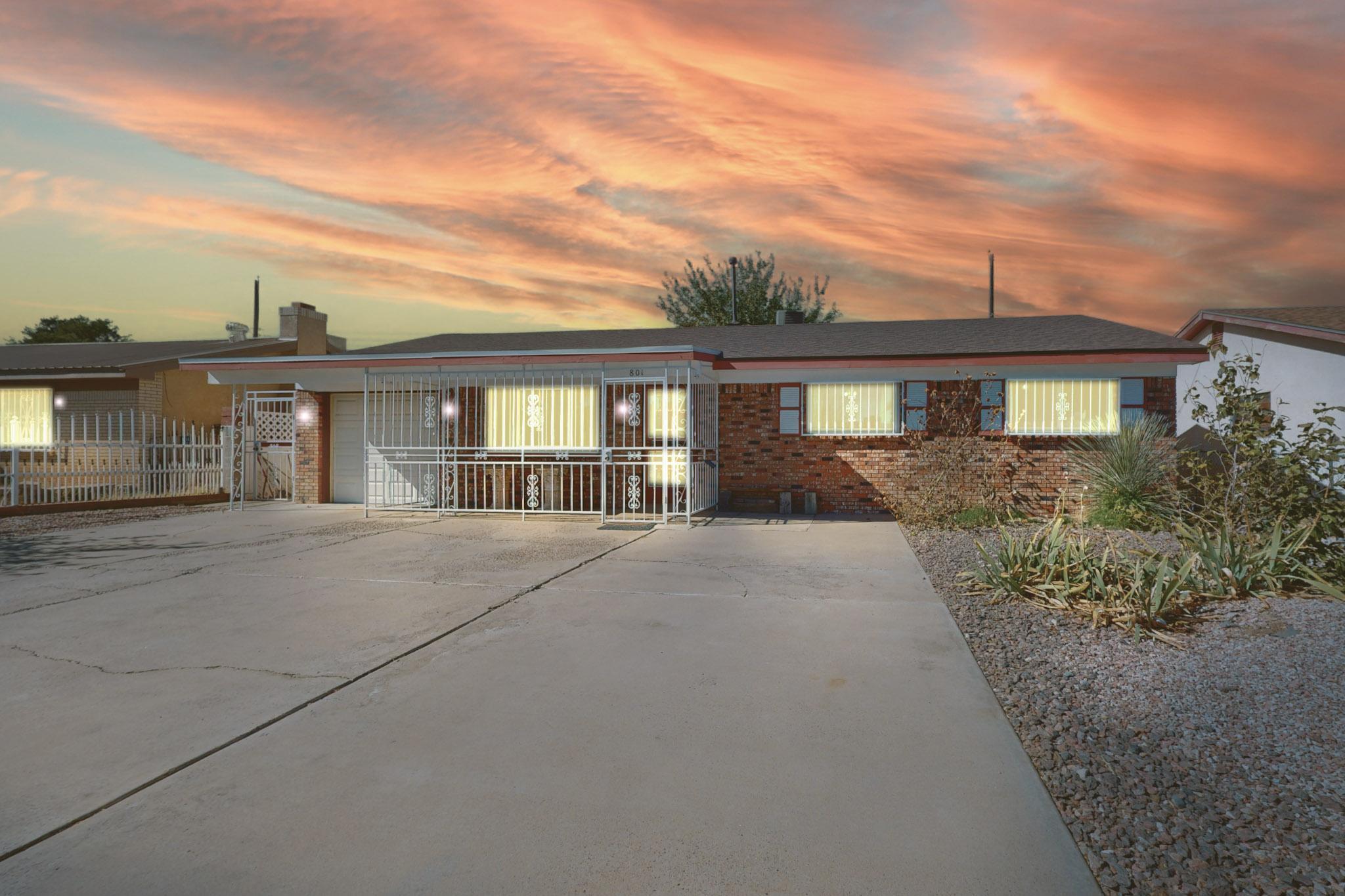 Welcome to this charming single-story, 3-bedroom, 2-bath home located in the heart of Albuquerque! This well-maintained property features two spacious living areas, perfect for relaxation or entertaining. Each bedroom provides a cozy retreat, with the primary suite featuring its own private bathroom.  Inside, the home is equipped with refrigerated air for cool, comfortable living. Outside, enjoy a private backyard perfect for relaxing or gardening. The outdoor space features drought-tolerant plants, decorative rocks, and water-efficient landscaping elements that provide year-round minimal upkeep. Ideal for eco-conscious homeowners, this xeriscape design not only conserves water but also ensures a vibrant, welcoming landscape that's as easy to care for. Schedule your showing today!