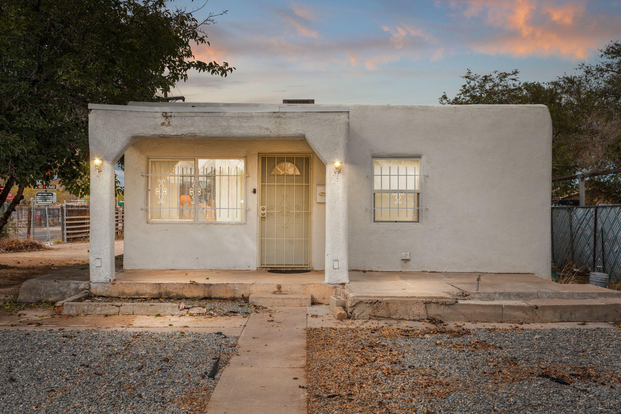 Welcome to this charming 2-bedroom, 1-bath home on a prime corner lot. Inside, you'll enjoy easy-care laminate flooring and the cool comfort of refrigerated air. The kitchen boasts sleek stainless steel appliances and white cabinetry, creating a fresh and inviting space. The home also includes the added convenience of a washer and dryer. Step outside to a spacious yard with backyard access, ideal for gardening, entertaining, or extra parking. Just minutes from local restaurants and shopping, this home is a true gem. This is your chance to own a home that's as functional as it is charming--whether you're a first-time buyer or ready to downsize, don't miss out. Schedule your showing today and make it yours!