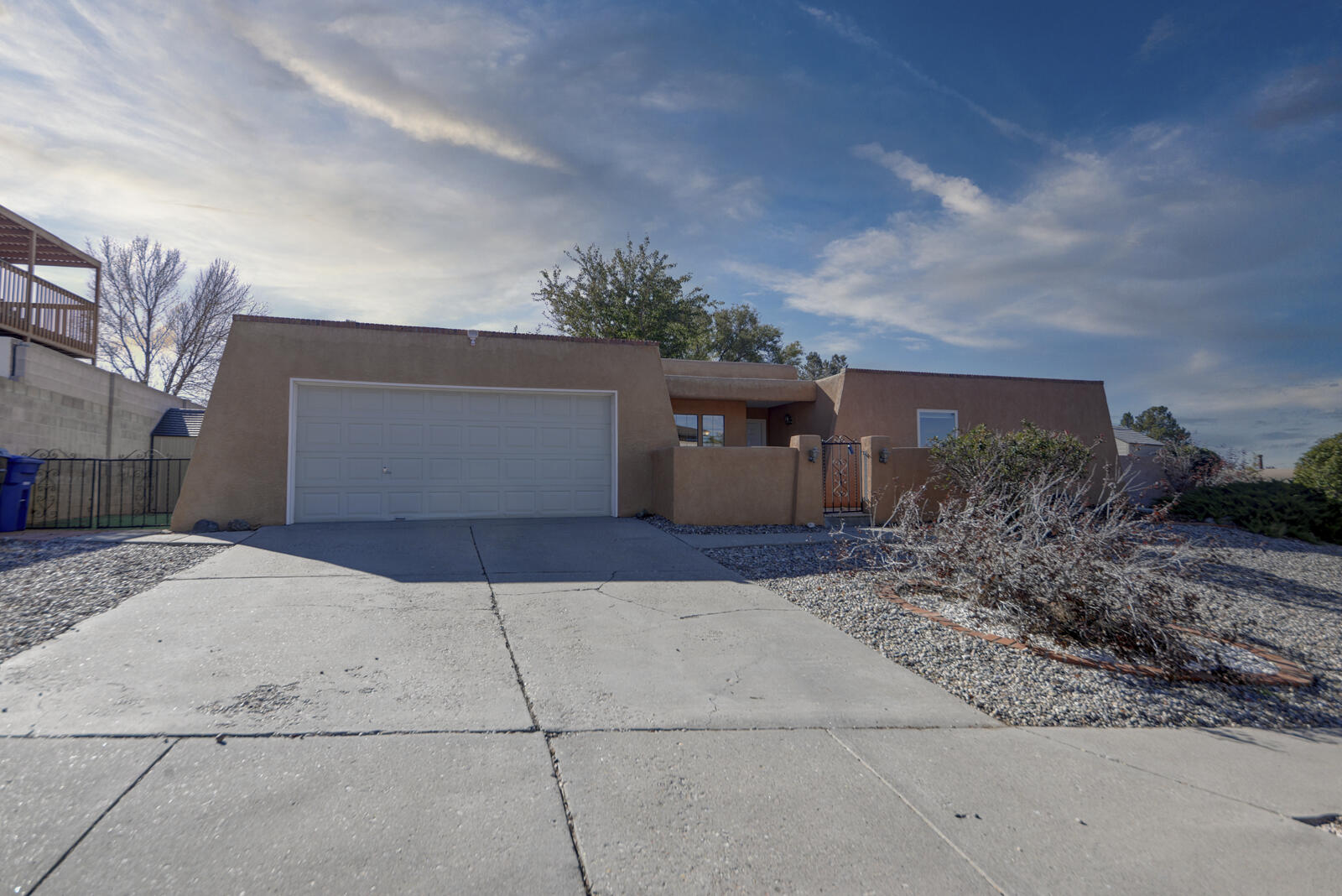 Nestled in the foothills of the Sandia Mountains, this single-story home offers the perfect blend of comfort, convenience, and natural beauty. Located near parks, open space, & a network of walking & biking trails, This home is ideal for those who love outdoor activities. In 2024, the roof received a tune-up, along with a full replacement of the roofing section over the garage.A brand-new stove and electric range were installed in September 2024, with a gas hookup option for future versatility.The home's mechanical systems have been updated, with the furnace and water heater replaced in 2016- 2017, the grassy section of the backyard was enhanced with an underground watering system, significantly reducing water evaporation and boosting absorption making it eco-friendly & efficient.