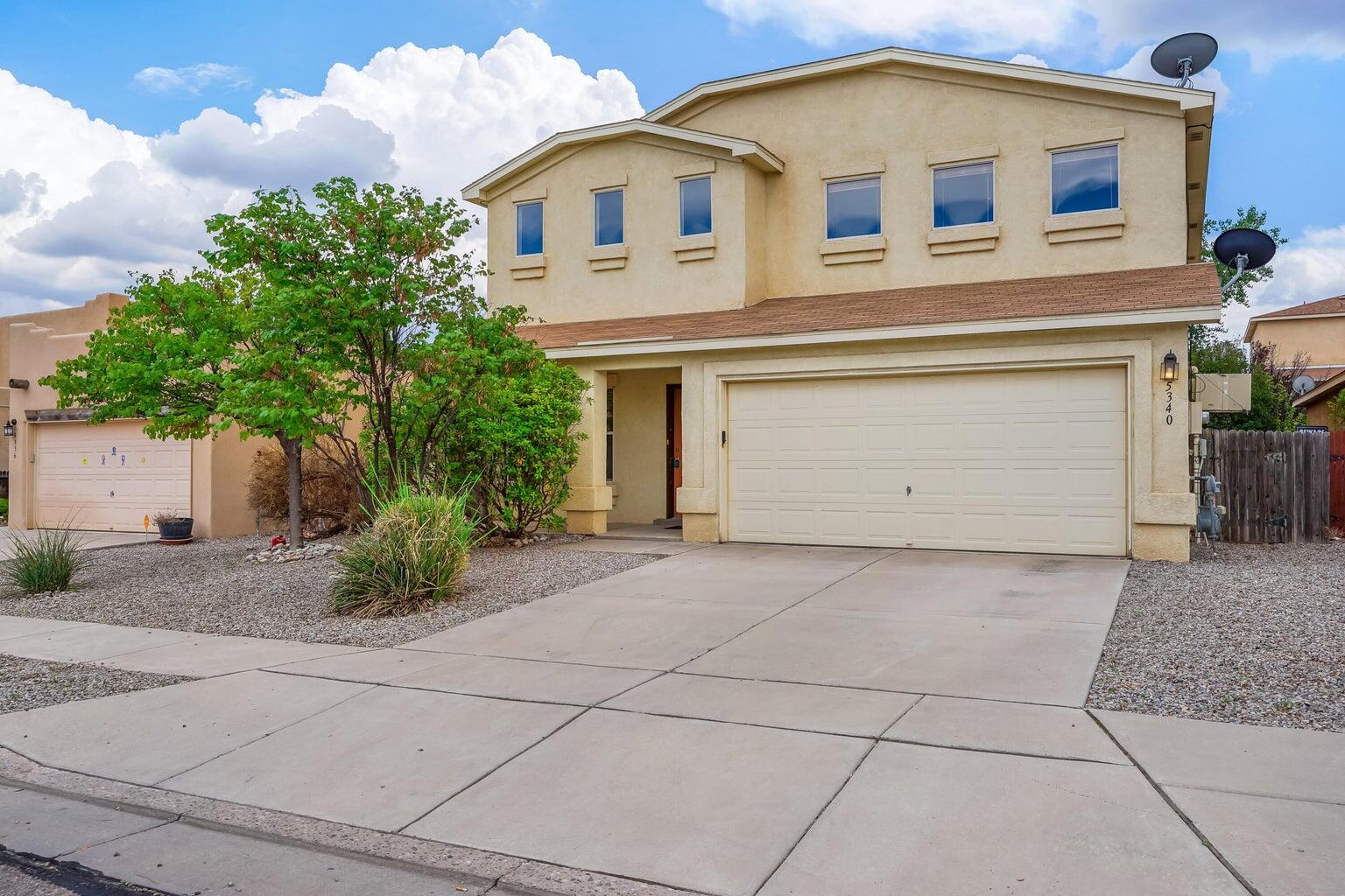 This spacious two-story home in NW Albuquerque combines comfort with convenience. It features refrigerated air for year-round comfort and large bedrooms perfect for relaxing or working from home. The open living area flows seamlessly, creating an ideal space for family gatherings or entertaining. Outside, enjoy a low-maintenance backyard designed for relaxation without the hassle of extensive upkeep. Located close to Rust Medical Center and the Unser Corridor, the home offers quick access to medical facilities, shopping, dining, and parks, plus easy commuting. Discover a peaceful yet well-connected lifestyle in this inviting Albuquerque home.