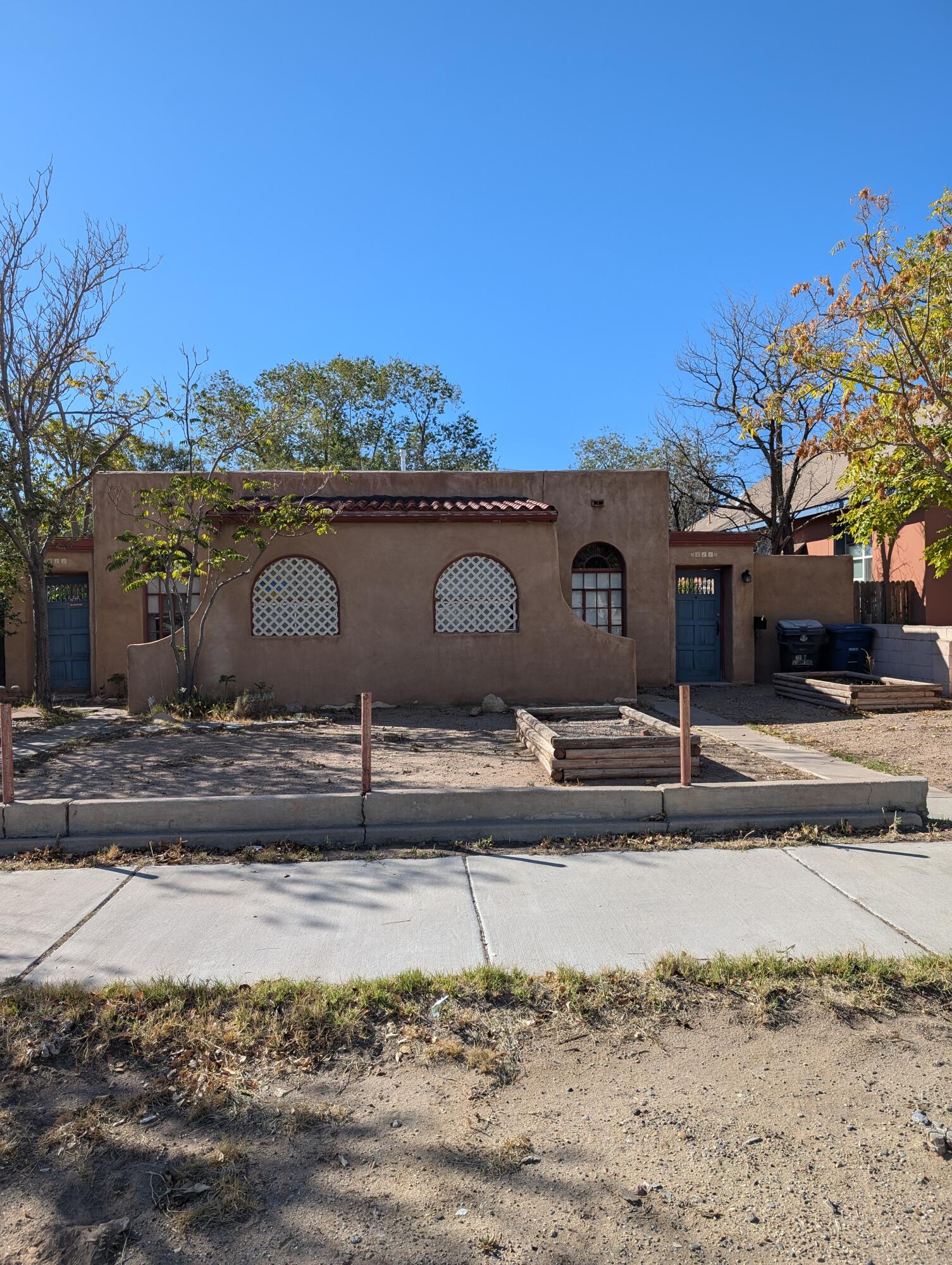 Great UNM/CNM/Nob Hill Investment Opportunity. This triplex has two 1 bedroom plus additional bonus room, side by side/mirror image floorplan. The studio unit is a  separate building in the back. Front units have lovely hardwood floors, mini splits, washer and dryer in each unit, dishwasher, private yard/patios. The studio unit has brick floors, high ceilings, sky lights,  full bath, washer/dryer hookups and private yard. All are separately metered, all units have additional outside storage. Parking available both on site or street.