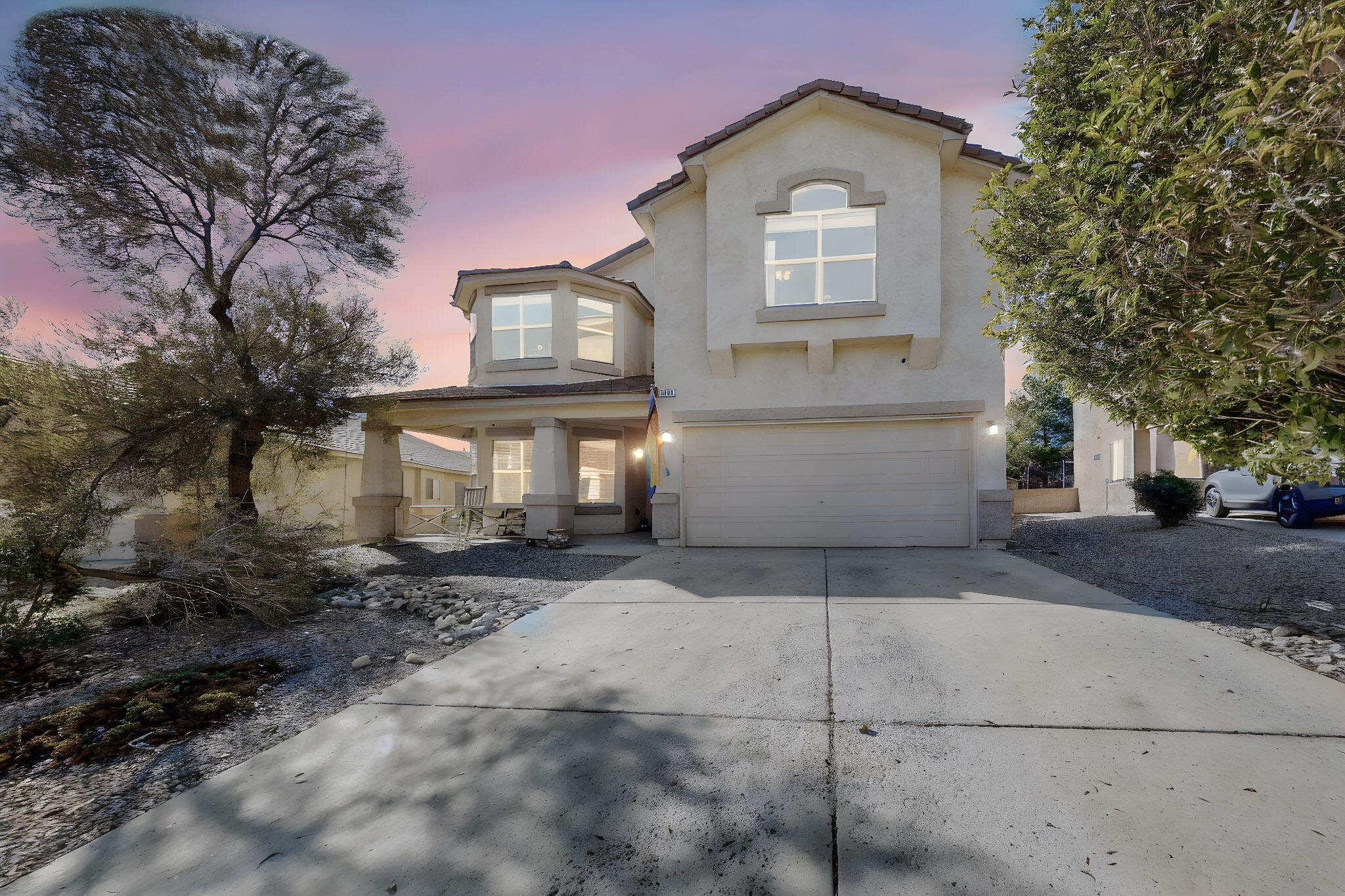 Welcome to this charming two-story home in Rio Rancho! Step inside to a spacious and inviting living room, perfect for relaxing or entertaining. The main level also features a separate dining room and family room, providing ample space for gatherings and daily living. Upstairs, you'll find generously sized bedrooms, including a large primary suite with step-in closets offering plenty of storage. The backyard is expansive, ready for outdoor activities, gardening, or creating your own oasis. This home is a fantastic blend of comfort and space, ideal for those seeking room to grow and enjoy. Don't miss it!