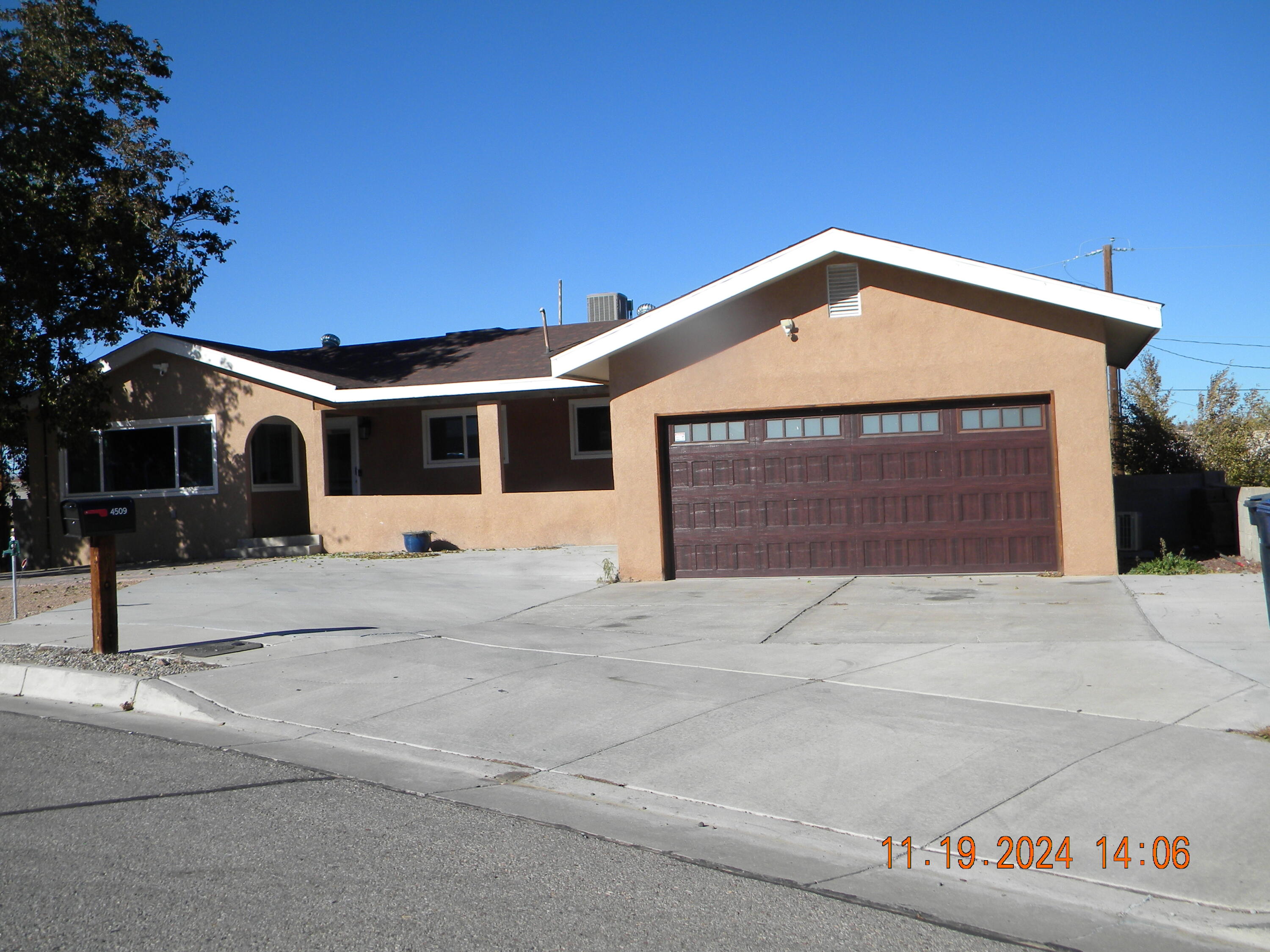 This wonderful home is situated on a large step-down lot close to shopping, entertainment and dining spots. Featuring expansive open living spaces perfect for entertaining, the main floor boasts a gourmet kitchen with high-end appliances, newer cabinets and granite counters. The main level features 3 bedrooms and 2 bathrooms along with a centrally located family area leading to the garage. Downstairs, the large primary bedroom offers privacy along with access to the backyard. The primary bath enjoys separate vanities, a custom designed shower and large closet. There is an additional living space which is large enough to be used as a home theater, game/pool table room or a fifth bedroom. Outside, enjoy a large lot for outdoor activities with a dog run, storage shed and a large open patio.