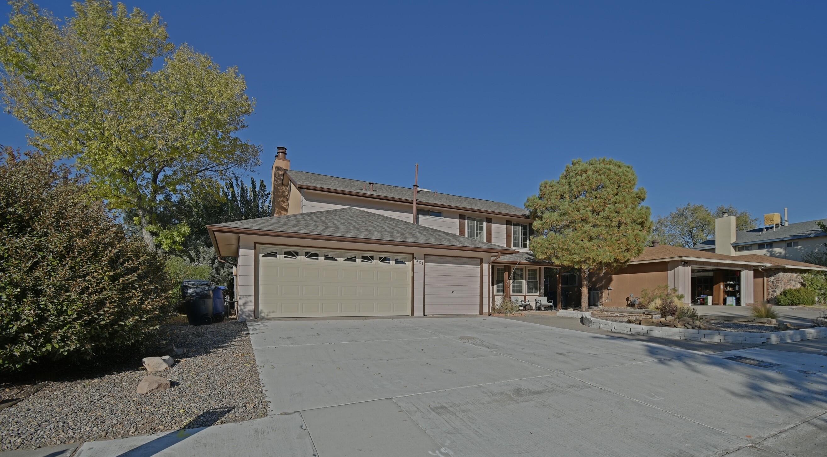 This house is an impressive 2,293 square feet, featuring four spacious bedrooms and three bathrooms. The exterior boasts beautiful landscaping, creating an inviting curb appeal. A three-car garage provides ample parking and storage. Inside, the home showcases elegant granite countertops in the kitchen, enhancing its modern aesthetic. Walk-in closets offer generous storage space, while two fireplaces add warmth and charm to one of the living areas and primary bedroom, making it a cozy retreat. Overall, this property combines functionality with attractive design, perfect for comfortable living.