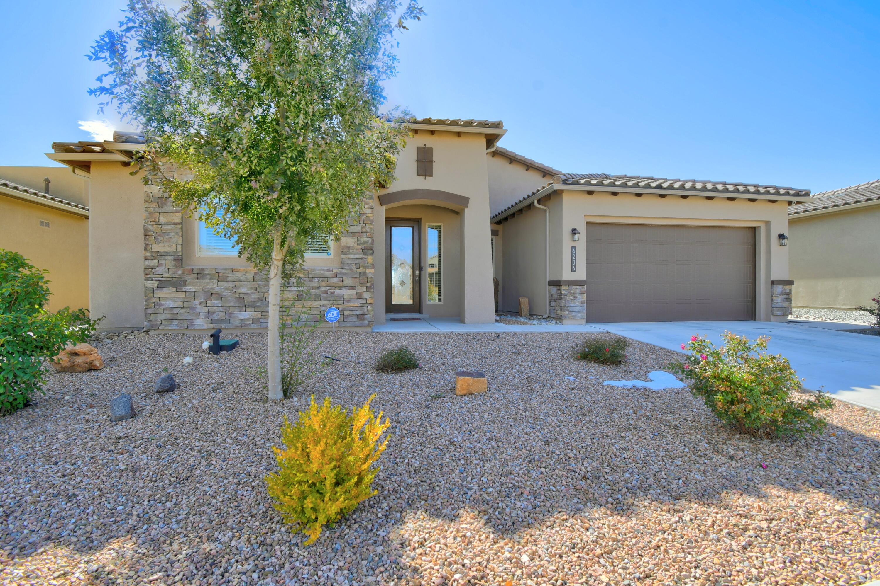 * PRICE IMPROVEMENT* Discover this charming green built certified home in La Cuentista II, featuring a spacious open concept floorplan. Boasting four bedrooms and a versatile flex/office space, this residence is perfect for modern living. The large island in the kitchen is designed for entertaining, while the private wrap around covered patio offers a serene outdoor living area with scenic mountain, city and sunset views. Additional highlights include a tankless water heater, water softener, a corner fireplace adorned with stacked stones, and ample storage throughout. The landscaped backyard and two-car garage complete this delightful property, making it an ideal place to call home.