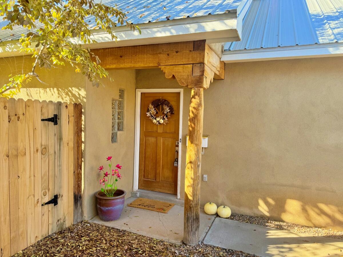 Fabulous 23yo Downtown residence, adjacent to the Fourth Ward historic district. The layout makes this place special: the open floorplan is filled with tons of light from the several large skylight/dormer windows atop the vaulted ceilings. See the 3D Tour then visit the Open House, Sat Nov 23rd 1-3p. This cozy home definitely favors the owners--the very generous-sized primary bedroom, with personal backyard access, also includes a large walk-in-closet & dual bathroom vanities, & is separated nicely from the 2nd bedroom, for maximum privacy. More to love: nichos, a gas Kiva fireplace, a finished two-car garage, attic storage space, great daylighting from the glass blocks in the prime closet & the lush back courtyard with raised garden area for your planting whims. Great location--come see!