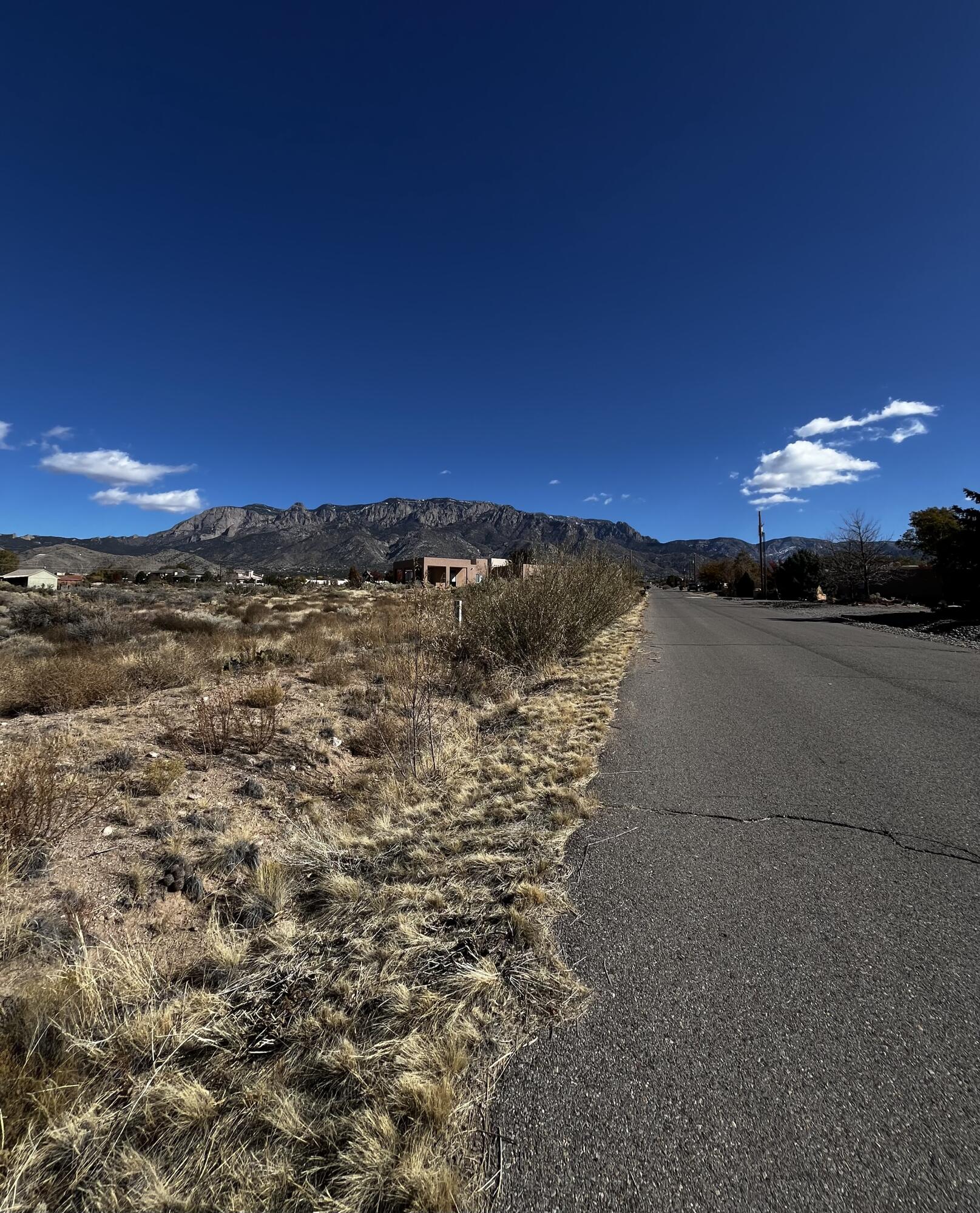 Beautiful .86-Acre Lot in North Albuquerque Acres with Amazing Mountain Views!Great Location: Close to excellent schools, shopping, restaurants, and outdoor activities--it's got the best of both worlds!