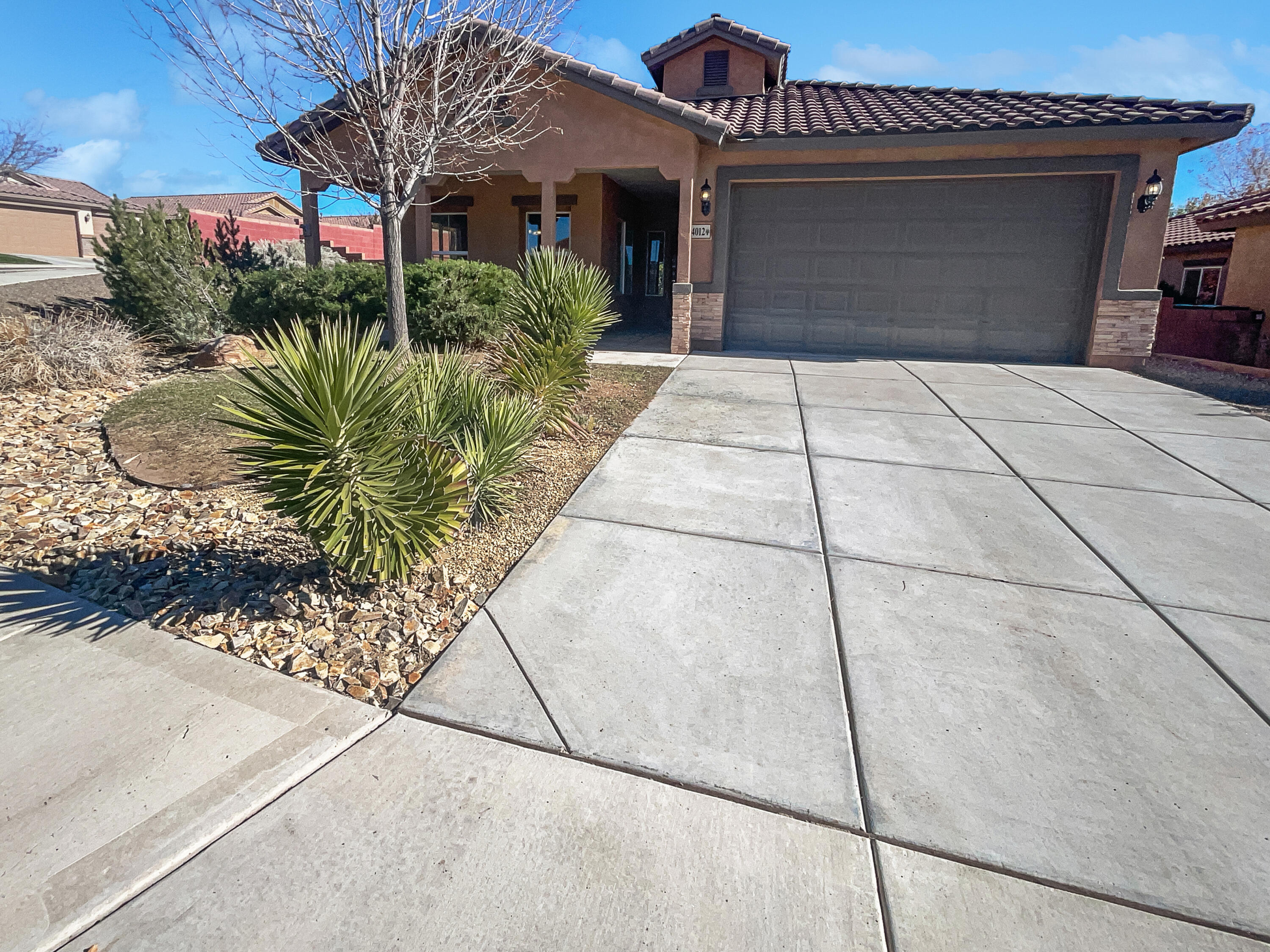 Welcome to this beautifully updated property that awaits your personal touch. The home features a neutral color paint scheme, giving it a modern and fresh feel. The kitchen is a chef's delight with a center island,  and all stainless steel appliances. The recent partial flooring replacement adds to the charm of the property. The covered patio in the back yard is perfect for outdoor relaxation and the fenced in backyard ensures privacy. The property has a fresh interior paint job, enhancing its appeal. Discover the comfort and convenience of this home, a perfect place to create your own memories.