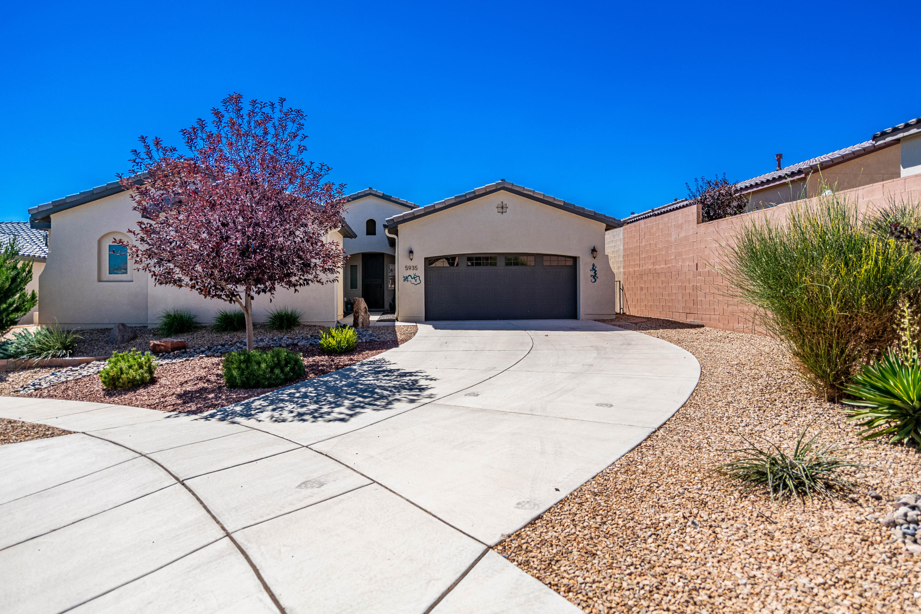 This stunning 6-year-old home in the desirable Mariposa subdivision is move-in ready and packed with upgrades. With NO PID, you'll enjoy significant savings, including a $14K benefit from the paid-off PID. The home boasts a fully landscaped yard and a nearly new saltwater hot tub--perfect for relaxing and entertaining. The spacious layout includes a large dining room with a custom 9-ft buffet and mirror, ideal for hosting gatherings and dinner parties. The open and airy feel continues throughout the home, with pull-out drawers in the kitchen cabinets for added convenience and a water softener for your comfort. Located at the end of a quiet cul-de-sac, this home offers access to Mariposa's exclusive private community center, which includes two pools, a fitness center, and more!