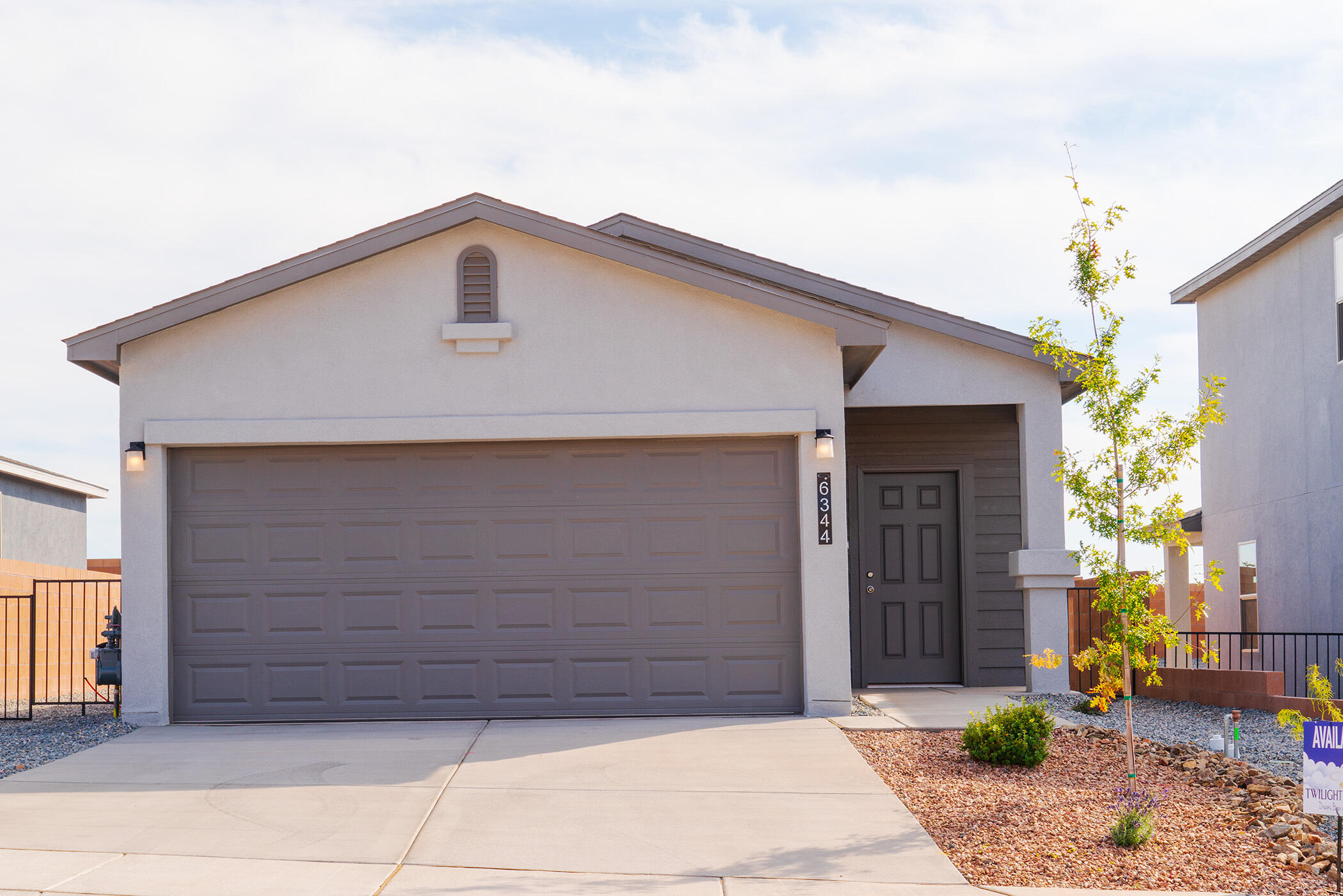 A desirable corner location! Welcome to this ranch style home by Twilight Homes that is ready for move in.  The Mountain Hawk community in Rio Rancho is just minutes from 550 and I-25. This home will meet all your desires. An expansive living room, large kitchen,a  dining room that leads out to a covered patio and an enormous,  back yard. Four bedrooms with a beautiful primary bedroom showcasing the primary bathroom which features a walk in closet ,dual vanities, granite countertops, and separate commode room,  along with a walk in shower. 4 bedrooms could allow for an  office or guestroom. Dual pane windows, Seer15 forced refrigerated ac, programmable thermostat, R49 ceiling insulation and R19 exterior wall insulation. Call today and ask for Specials.