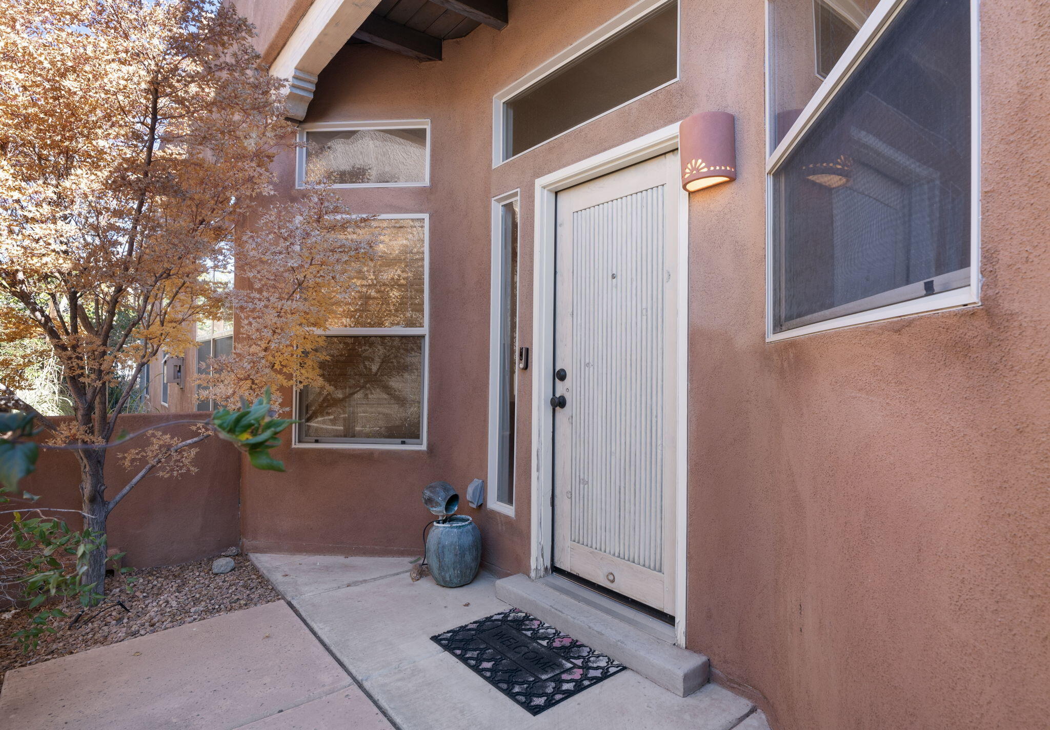 This home is in a highly sought-after gated community on the east side of Albuquerque, this beautifully maintained 3-bedroom, 2-bathroom home offers the perfect blend of comfort, style, and functionality. With1,600 sq. ft., Step inside to discover a bright and inviting interior, complete with refrigerated air to keep you cool year-round. The well-appointed kitchen features ample counter space and storage. Enjoy the added peace of mind that comes with living in a secure community, complete with well-maintained common areas. Whether you're relaxing on the patio with mountain views or exploring the neighborhood, this home is designed for easy living in one of Albuquerque's most desirable areas.