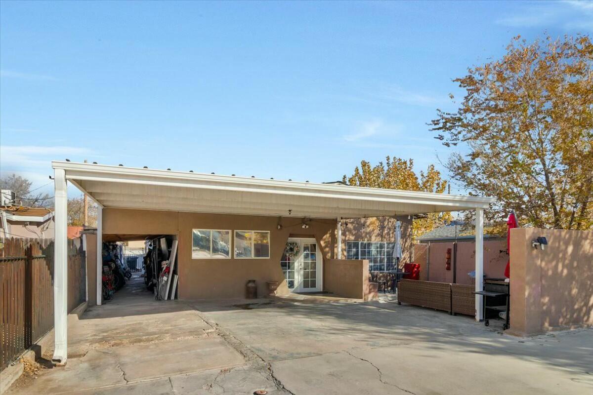SELLER OFFERING $20,000. CREDIT TO BUYER at closing, can be used for repairs. Welcome to 121 Hosher Ave SE, Albuquerque, NM. This 3-bedroom, 2-bathroom home features an open-concept design with modern features, a bright and inviting atmosphere. The living and dining areas flow seamlessly, making the home ideal for entertaining or everyday living.The property offers a modern feel and look. This home is priced to reflect its current condition, offering buyers an excellent opportunity to customize and add value. Please note that the home features multiple interior steps, so visitors are encouraged to watch their step while exploring.Minutes from Albuquerque's top attractions, including Old Town Albuquerque.