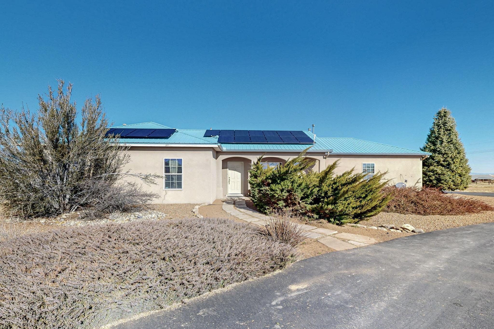 Attention airmen! Beautiful home inside Sandia Airpark.  51x51 hangar, separate 3 car garage, sauna, horses allowed! Enjoy a large office/hobby/recreation room, 3 bedrooms, 2 bathrooms, gas fire place, granite counter tops in kitchen, tile flooring.360 degree views. Have to see to appreciate.