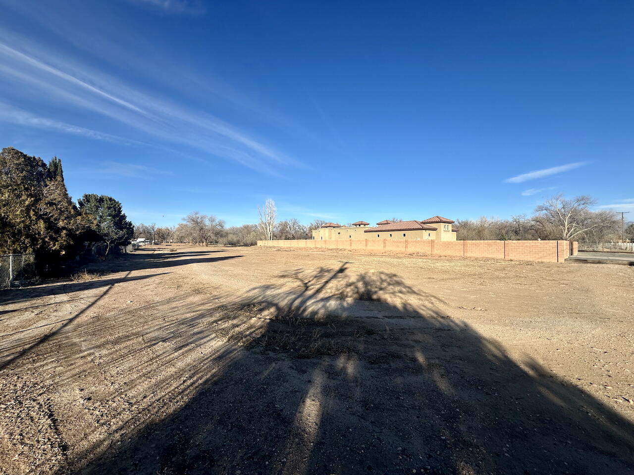 Discover 1.27 acres of agricultural-zoned land with access to an irrigation ditch - perfect for your dream home or hobby farm! Just 0.2 miles along the Duranes Trail to the Bosque, this property offers easy access to the stunning Rio Grande Bosque Trail, where Cottonwood trees, wildlife, and trails for biking and horseback riding abound. Enjoy the tranquility of being near the river without the worry--this lot is not in a flood zone, so no flood insurance is required. Ideal for a private retreat, horse property, or sustainable living, this slice of paradise is ready for your vision. Lots of options on this ''Sector Development Los Duranes Rural Agricultural Zone'' (SD-LD A-1) lot with over 1 acre of vacant land in the North Valley! See all the Documents for details.