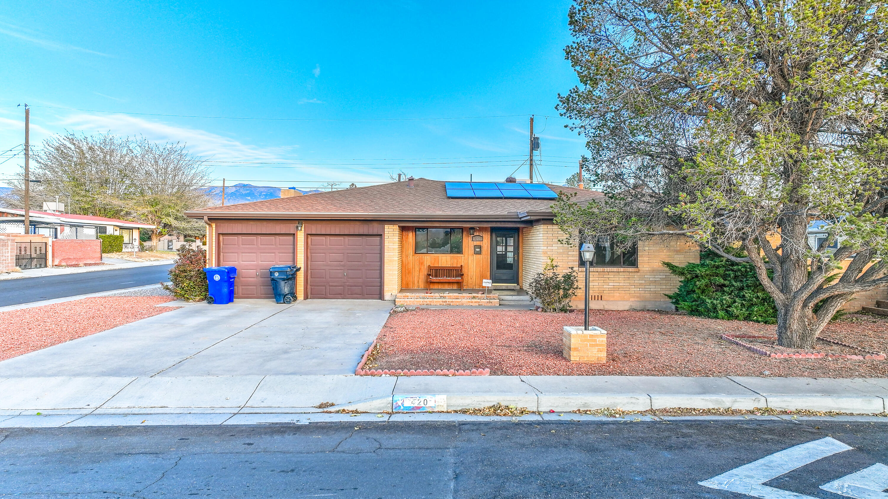 A must see wonderful and well maintained  1 story home on a  corner lot.  This charming 3 bedroom 2 bath has 2 spacious and  versitiile living rooms. Built in shelves and cabinets. A fantastic screened in porch great for entertaining and nicely landscaped yard. Energy effecient solar panels to keep electric cost down.