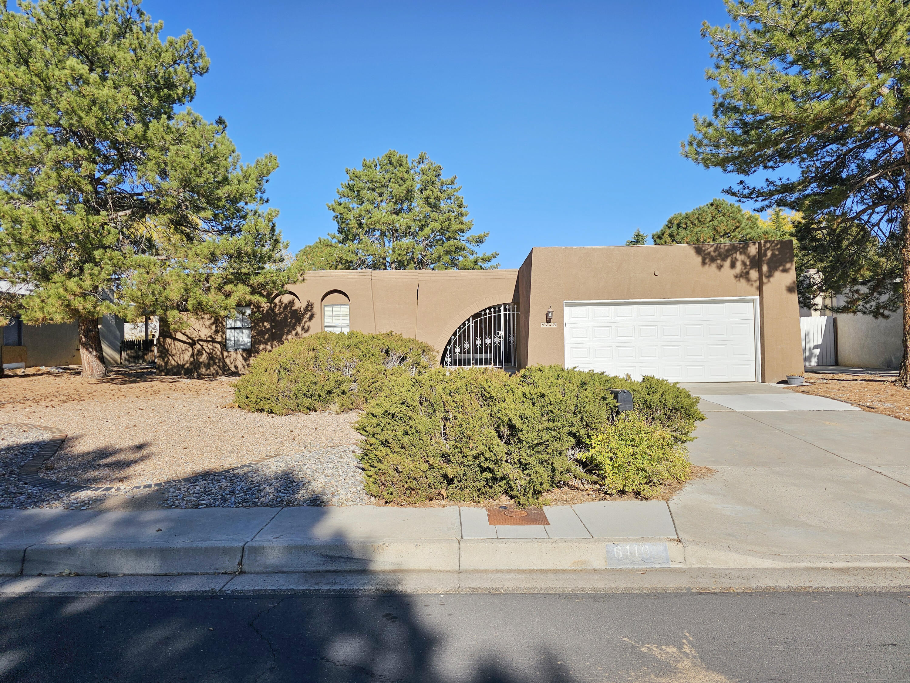 Fabulous single story home in Northeast Albuquerque! Nice, mature landscaping in front yard, great size private backyard, fantastic location! The kitchen is nice and spacious with an eat in area, formal dining room and living area with corner fireplace. This home boasts three spacious bedrooms! Nice covered patio and private entry to home. The 2 car garage is a great bonus! Perfect location come take a look!