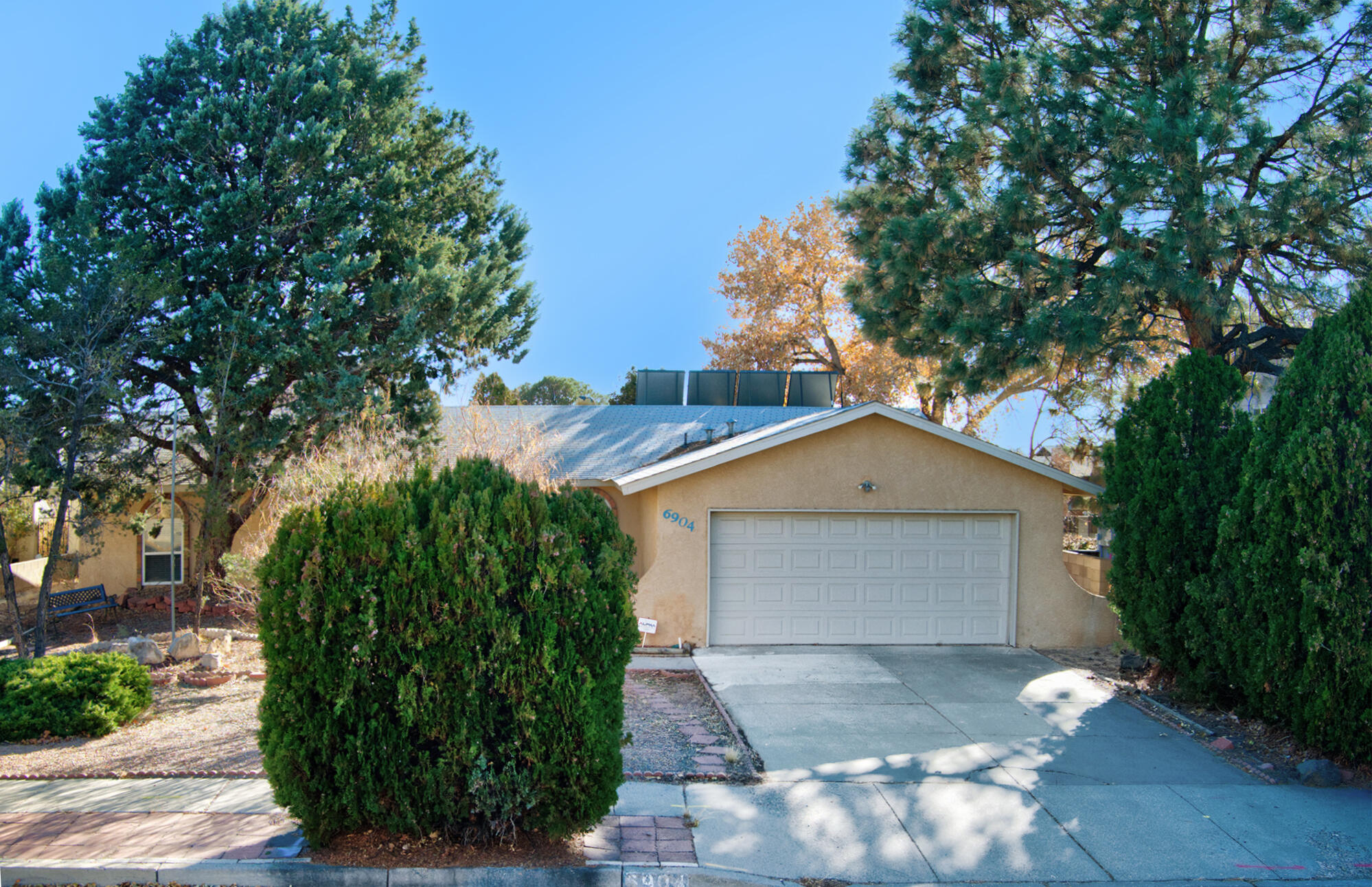 Discover this spacious home in a highly sought after neighborhood. Did I mention there's NO HOA?!?! With multiple living areas, including a potential home office, game room or 4th bedroom, this home offers the flexibility to suit your lifestyle.Enjoy the beautiful wood tile floors, a modern kitchen with Corian countertops, and ample storage space. The convenient location near Arroyo Del Oso Golf Course, shopping, and dining makes this home even more appealing.