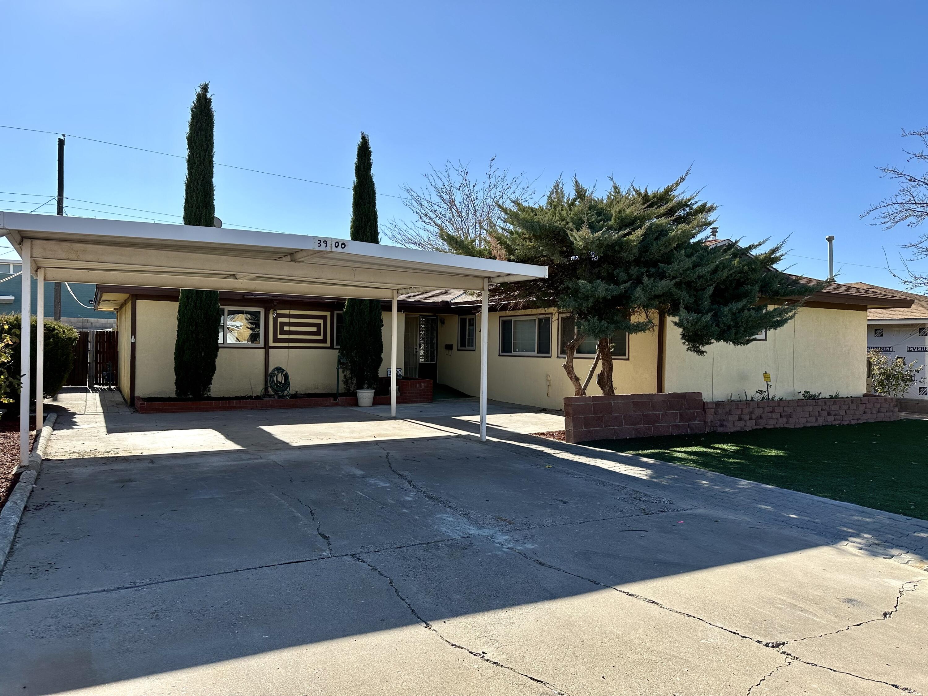 Open floor plan with paid off Solar panels and updated windows throughout. Beautiful home for sale has many options and space for the whole family. Fresh paint inside and out, carpets professionally cleaned, mutiple living areas to enjoy, a large sun room and options for a 4th bedroom. A large kitchen with plenty of counterspace for entertaining and a lot of cabinet space. 2 living areas that can be used as a playroom, gym, office and MORE! 3 way wood burning fireplace in the middle on the home and a pellet stove in the main living area. Paid off solar panels to save on electric bills. Updated shower surround, and all appliances stay. Schedule your showing today!