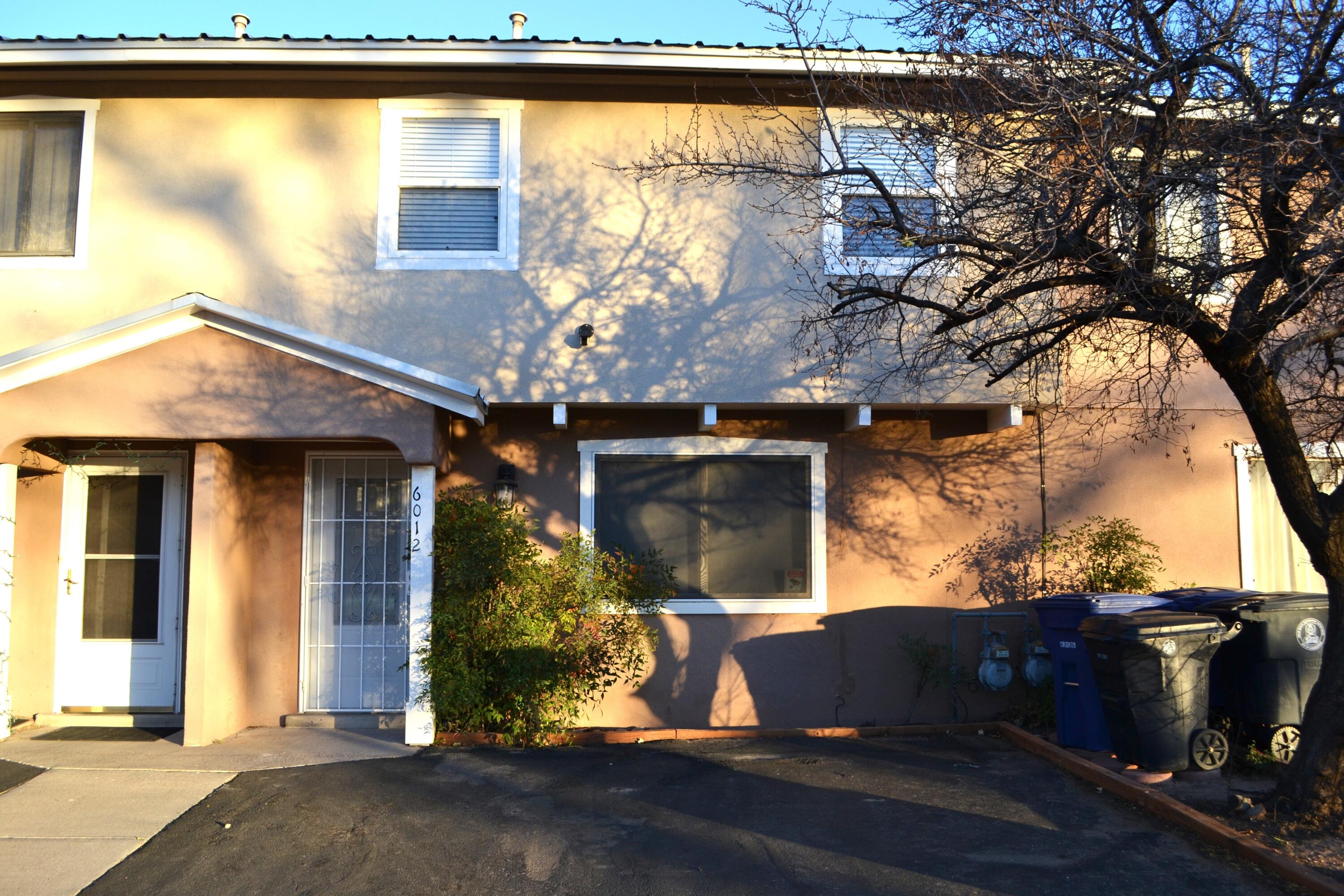 Nestled in the highly desired North Valley, this charming two-story townhouse offers a rare blend of comfort, convenience, and access to some of the valley's best eateries and attractions. With 1,178 sq ft of completely renovated, thoughtfully designed space; this home offers3 bedrooms, 1.5 bathrooms, fully remodeled kitchen-master bedroom-main bathroom. Includes private2-car parking plus nearly unlimited visitor spaces, making it perfect for hosting. Covered backyard patio steps down into a meticulously cared for SYNlawn yard with built-in putting green!The gorgeous view of Grecian Park directly outside the front door offers a unique feature in Townhouse living.