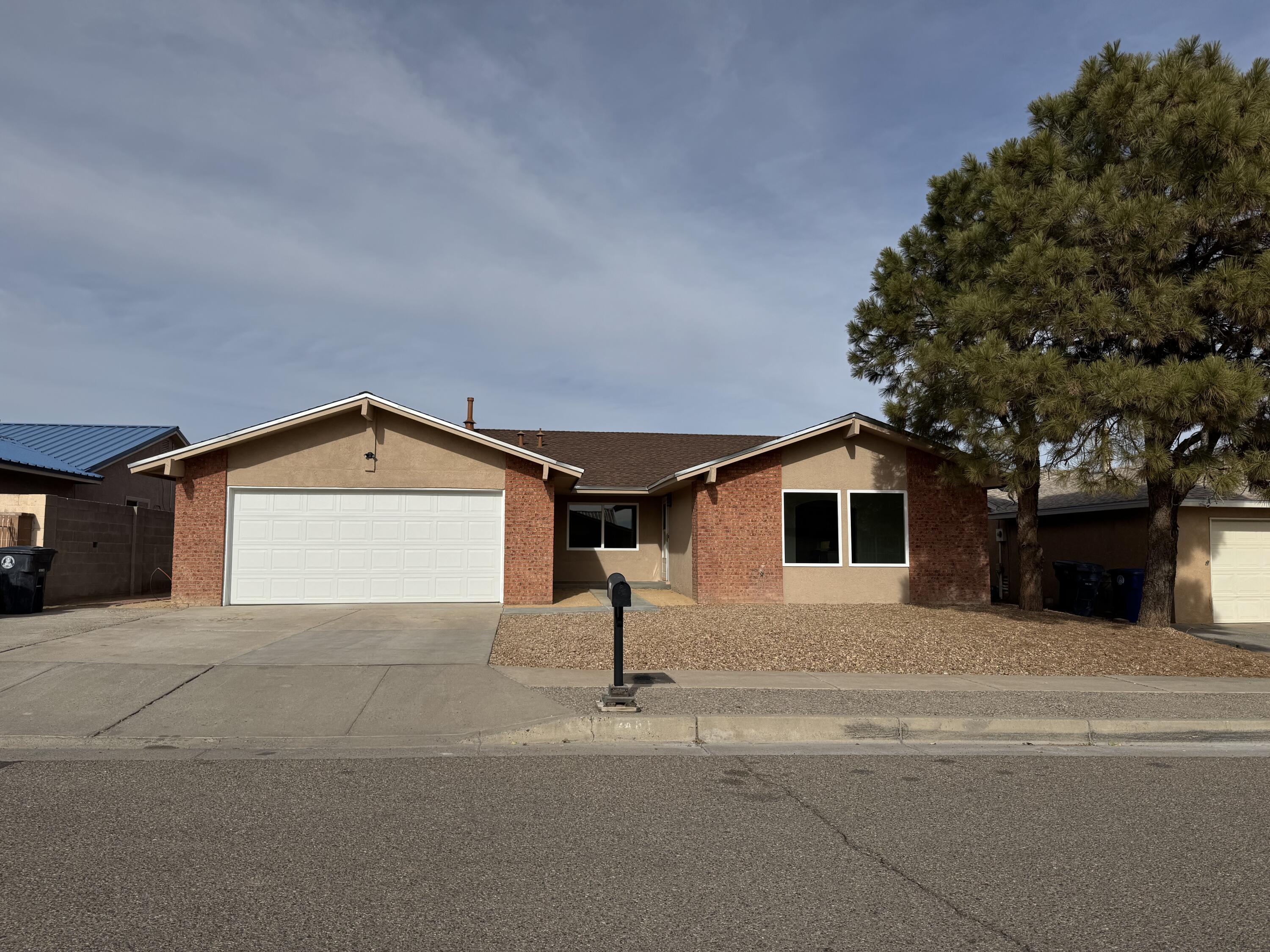 Welcome to this spacious 4 bedroom home.  This 1967 sq.ft. home has been beautifully remodeled, offering modern features.  Upgrades completed Nov. 2024 include: new HVAC system for year round comfort, new windows throughout the home, vinyl flooring, shaker cabinets, granite countertops and stainless steel appliances in the kitchen.  Both bathrooms have been updated with modern vanities, granite countertops and porcelain tile flooring.  Enjoy a private backyard featuring a large covered patio, perfect for relaxation or entertaining.  This home is move-in ready. Don't miss this opportunity to own this exceptional property.