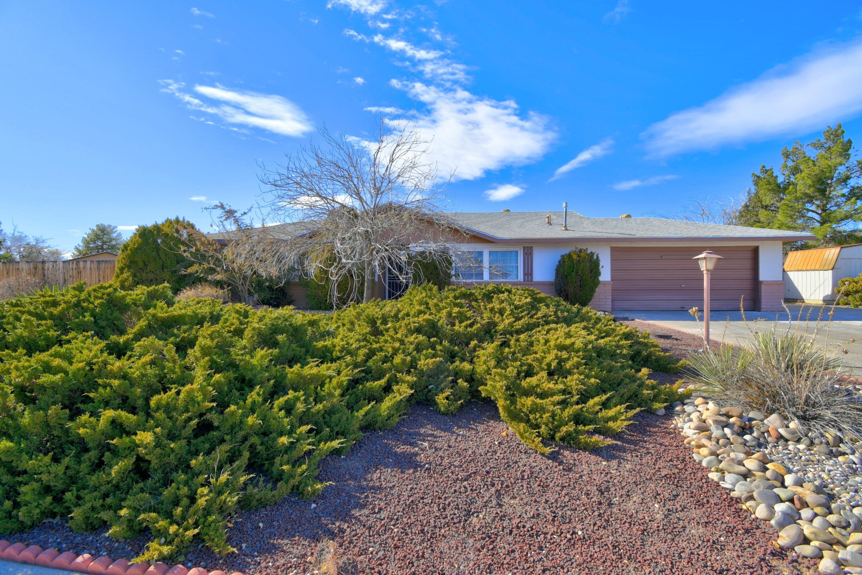 Great single story home in Corrales Heights.  3 bedroom, 2 bath with living room and den!  Enjoy the covered patio and large backyard. RV pad or a place to keep your boat.  Great location in Rio Rancho.  Close to shopping, restaurants, post office and more.