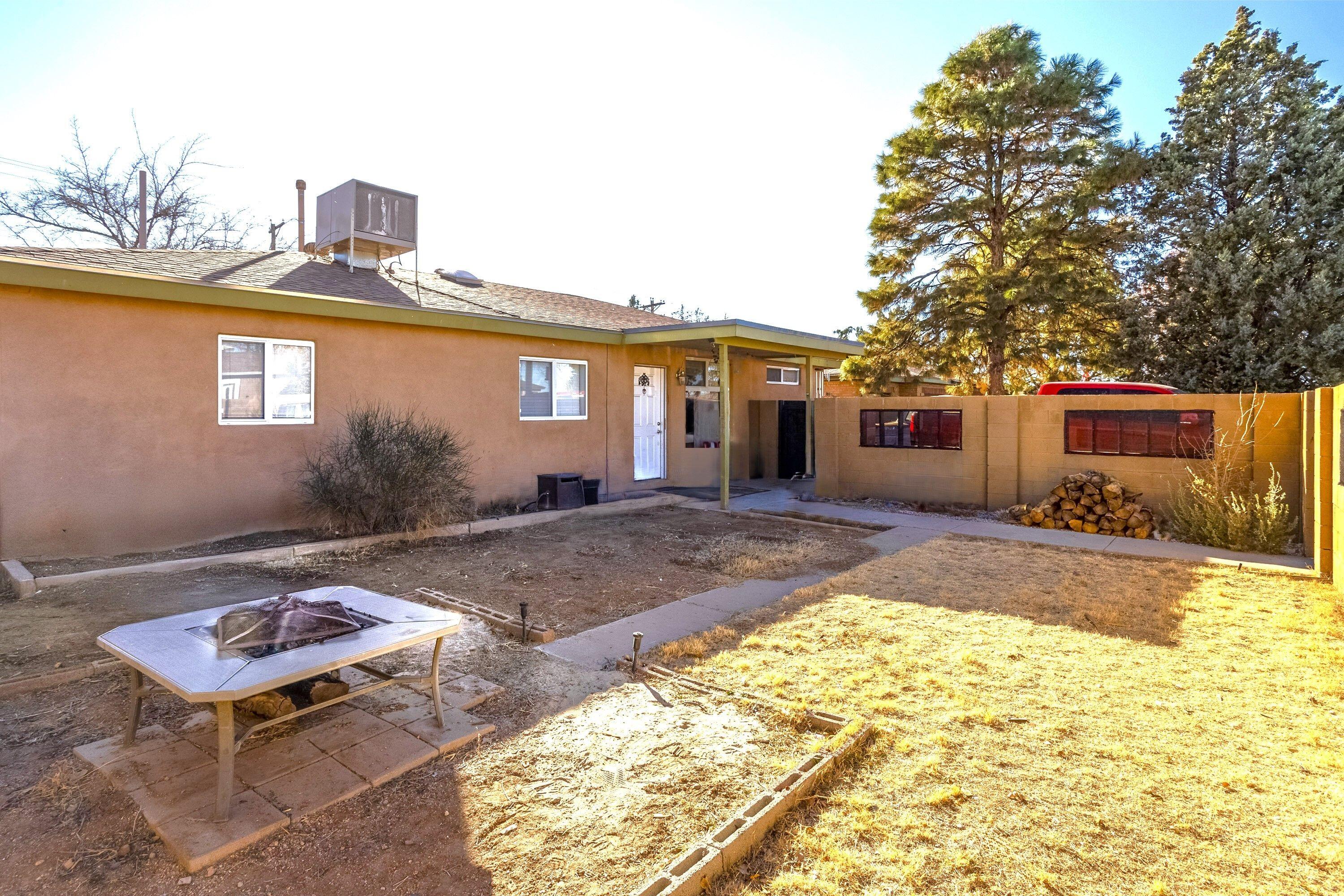 9006 WOODLAND AVENUE NE, ALBUQUERQUE, NM 87112  Photo 2