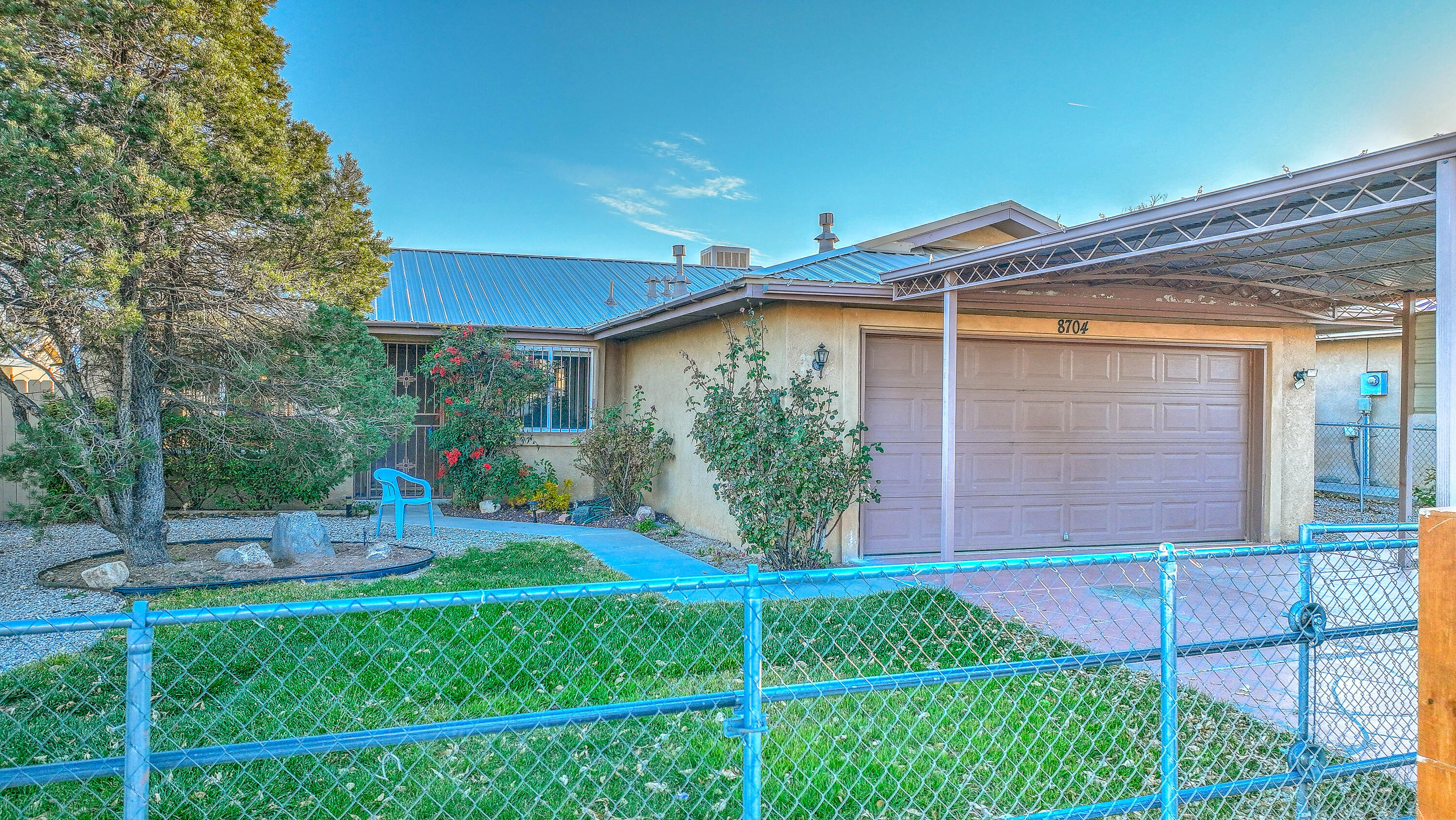 Welcome to this well cared for ready to move into home. Newer Metal roof  2020 . Newer water heater 2023 . New cabinets and granite  in kitchen. Ac was replaced 2024. Drip system  installed  outside with beautiful  rose Bushes and grass. Carport for extra parking. Side yard access possible.  Storage  shed might convey with acceptable offer.