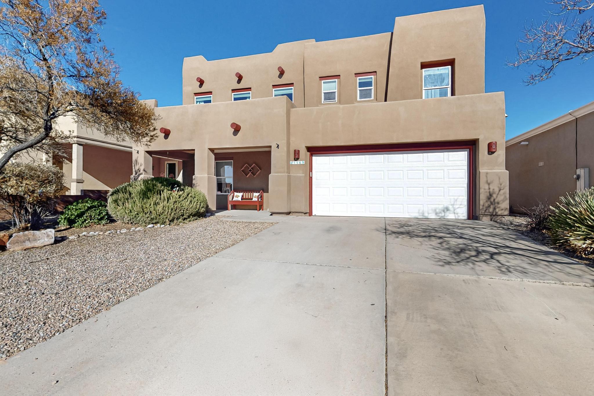 Spacious and bright KB floor plan in Rio Rancho with solar panels, water softener, kitchen appliances, washer/dryer, and more! This 6-bedroom, 3-bathroom home features 2 living areas, 2 dining areas, and an open kitchen with a large island, pantry, and motion sensor lighting. Enjoy the backyard with a covered patio, propane fire pit, lilacs & honeysuckle, perfect for entertaining. The oversized primary suite offers a balcony, California Closet system, garden tub, separate shower, and double sinks. Downstairs bedroom and full bathroom are ideal for guests. Upstairs laundry, ceiling fans, and 2 refrigerated air units add comfort. Convenient location with views of the Reservation, Jemez, Santa Fe lights & Placitas. Schedule your tour today!