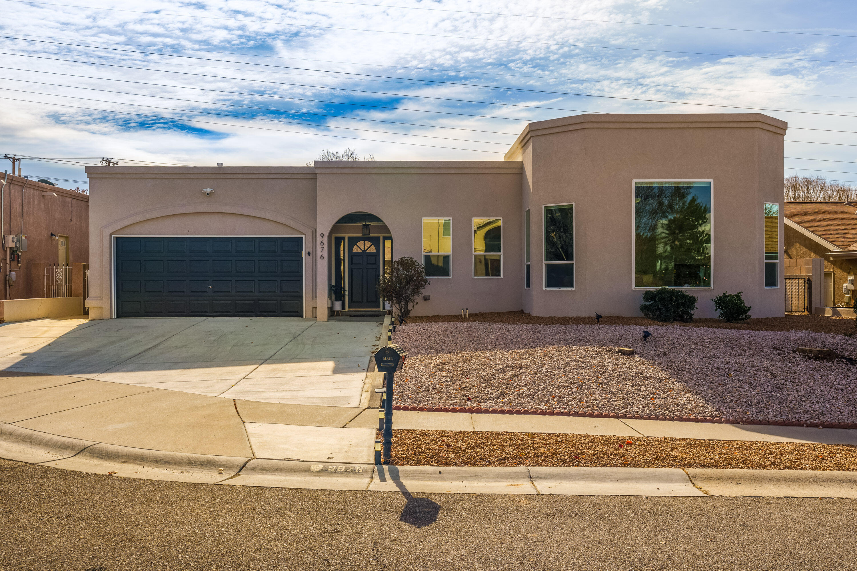 This stunning Heritage East home is tucked in a lovely cul de sac and backs to the peaceful Jay Yogeshwar Trail. Freshly painted, this bright and open floorpan features 5 bedrooms, 3 baths, a large and open living room, a flex space, and a studio to sneak away to work, grab a workout, or just a little quiet reprieve. The kitchen boasts rich granite countertops, elevated appliances, and a breakfast nook. Lovely little surprises like a built out primary closet, power window treatments, a sparkling hot tub, and a private and effortless backyard await. Well loved and cared for, this home is ready for you!