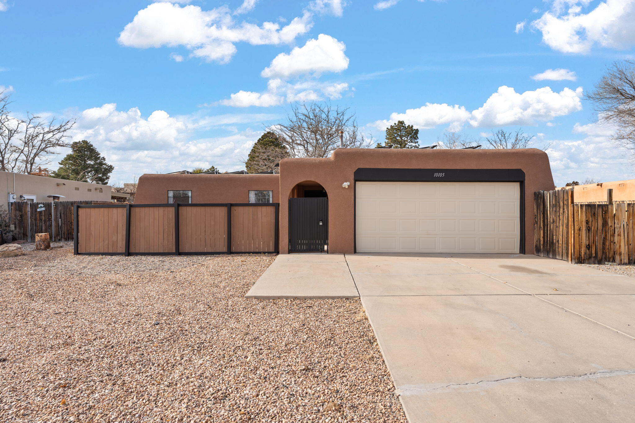 This fully updated home in Rio Vista, Paradise Hills offers 3 bedrooms, 2 baths, and a 2-car garage. The modern kitchen features sleek granite countertops and stainless steel appliances, flowing into an oversized living area with a kiva-style fireplace and wood beam ceilings.Enjoy a 16-ft wide side gate with backyard access and a 50-amp hookup, ideal for RVs or trailers. Paid-off solar panels, a 2018-installed TPO roof, and refrigerated air ensure comfort and energy efficiency. Fully furnished and move-in ready!Seller is open to owner financing options--don't miss this opportunity to own a charming, energy-efficient home in a fantastic neighborhood. Schedule your private showing today!