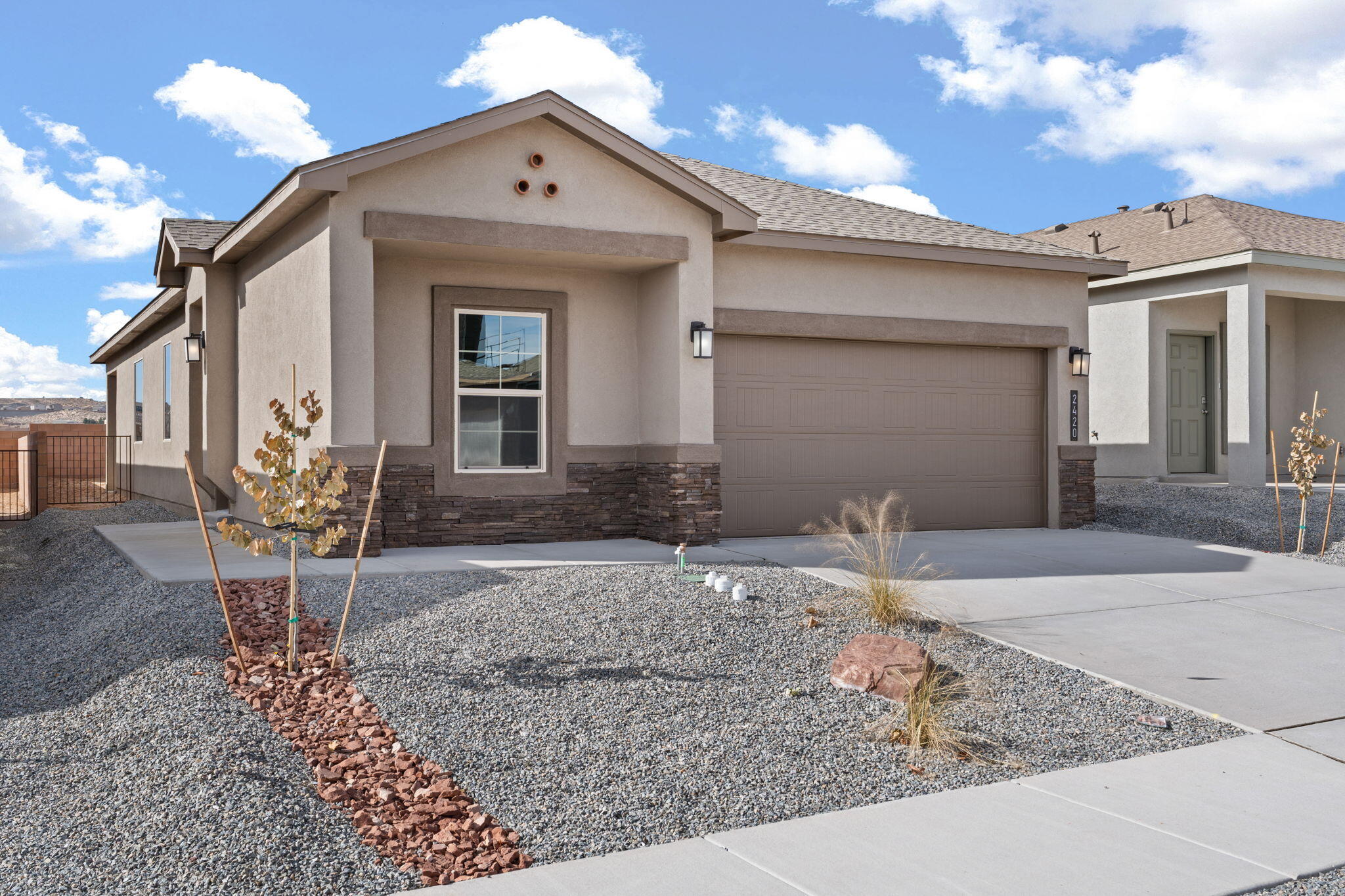 Discover the perfect blend of modern living and convenience in this brand new D.R. Horton smart home, located in the highly sought-after Rio Rancho community. With 1,602 sq ft of open-concept living space, this home is designed to meet the needs of today's lifestyle. The kitchen is illuminated by elegant pendant lighting, creating a warm and inviting atmosphere for family meals and entertaining.The home boasts tile flooring throughout, adding both durability and style. A spacious large pantry offers ample storage, and with four distinct color packages to choose from, you can personalize your space to suit your taste.Experience the latest in smart home technology, energy efficiency, and contemporary design. Don't miss the opportunity to call this stunning home your own!