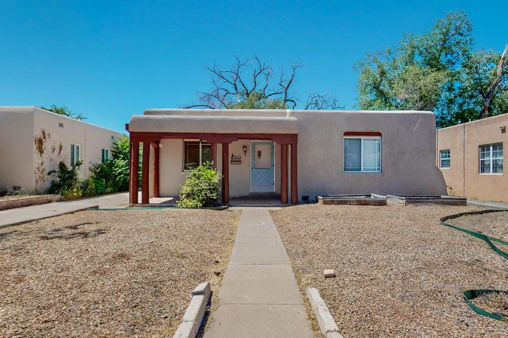 Nestled in the heart of Albuquerque's iconic Nob Hill and Monte Vista neighborhood, this Pueblo-style home offers timeless appeal and endless potential. This residence has been a rental property for many years, presenting a unique opportunity for both investors and homeowners alike. The home boasts traditional architectural details, including stucco walls, hardwood floors, a flat roof, all emblematic of the Pueblo Revival style that defines the area. The interior is a blank canvas with a fresh coat of paint, is ready for updates or customization to suit your personal taste or investment goals. Located just minutes away from the vibrant shops, dining, and entertainment that make Nob Hill one of Albuquerque's most sought-after areas.