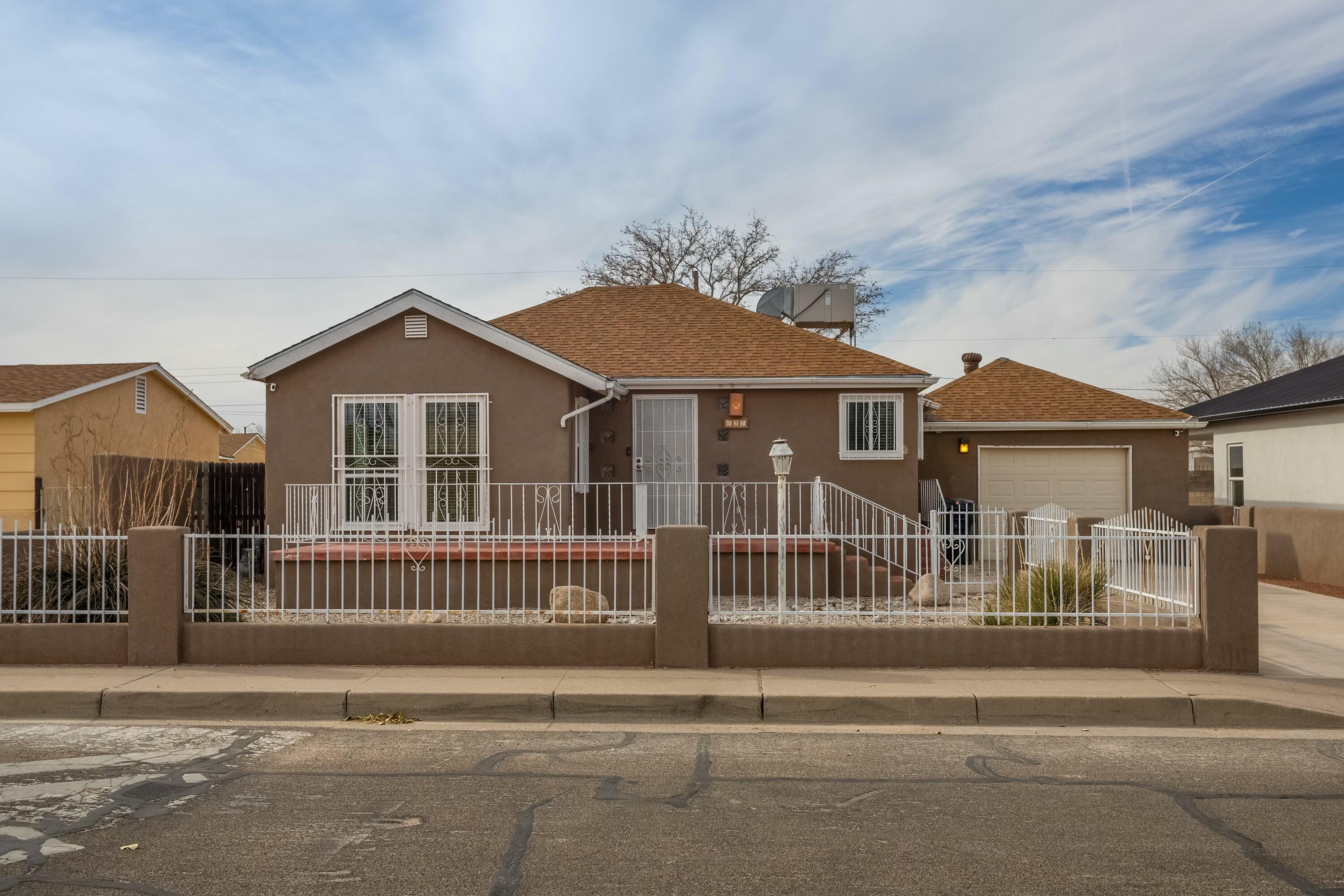 Are you searching for your ideal home on the west side of Albuquerque? This custom home with 2 spacious bedrooms and 3 bathrooms could be the perfect fit for you. Designed for comfort and style, it provides a great space for enjoying time with family and friends, offering an outdoor deck and covered patio in the backyard.  Conveniently located near both public and private schools, it offers quick access to many shopping locations, dining and is only minutes away from I-40, making it a practical choice for those with a busy lifestyle. For leisurely weekends, you can take a stroll to nearby ABQ BioPark or Old Town Albuquerque, adding to the appeal of the location. This property is suited for first-time home buyers who value comfort and convenience, as it has been well