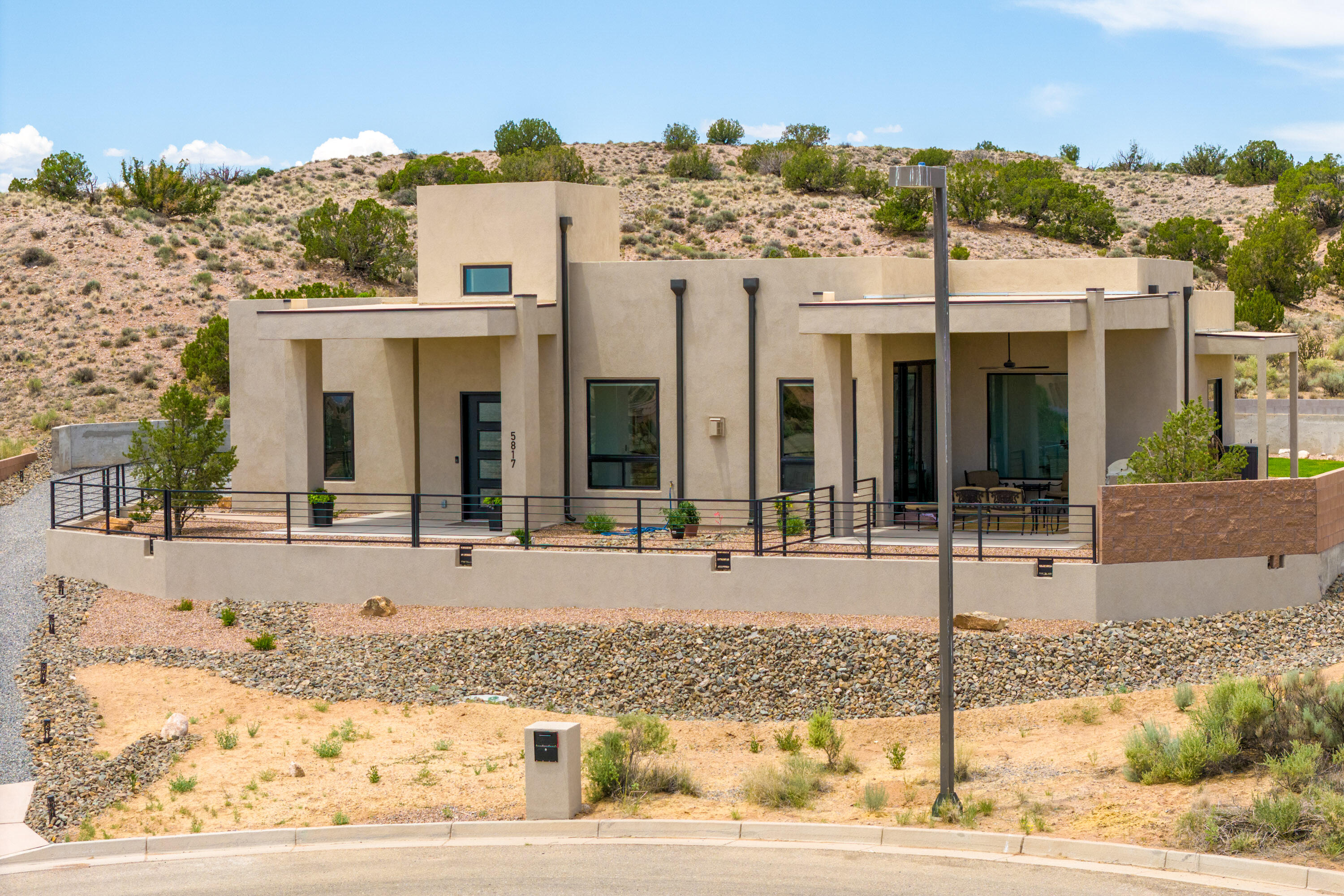 Stunning Contemporary Style Home Located in the Scenic Highland Meadows Area in Mariposa! Completed in October 2023, this Custom Built One Story Home is Situated on a .69 Acre Lot w/Panoramic Views of the Mountains & Vistas! Owners have Added $112K in Upgrades which include: Iron Fence, Window Blinds, Landscaping, Fireplace Tile Surround, Built-in BBQ, Retaining Wall & Garage Epoxy to name a few!! Features: Luxury Vinyl Flooring Throughout, Huge Picture Windows, Amazing Fireplace, Skylights, Primary has a Beautiful Bath w/Roll In Shower & Soaking Tub & Huge WIC, 2 BR's w/Jack and Jill Bath, Den/Office, Amazing Kitchen w/Jenn Air Appliances, Two Ovens, Large Island, Granite Countertops, Roll Outs and Soft Close Cabinetry Throughout. Huge 3 Car Garage w/Storage, EV Outlet! Builder Warranty!