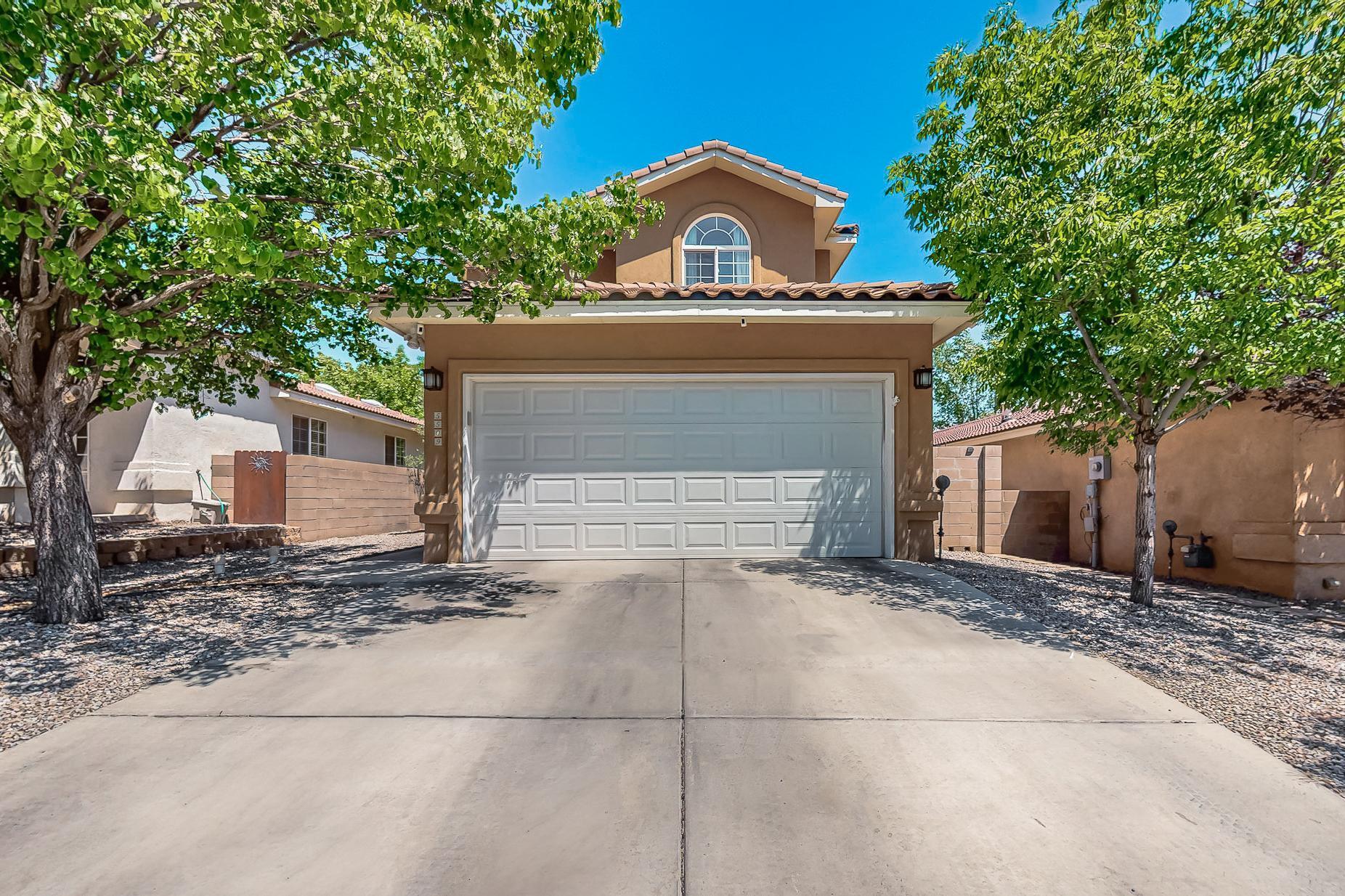 PRICE IMPROVEMENT! This beautifully updated home offers the perfect blend of modern upgrades and timeless charm in a highly sought-after location. With a brand-new roof installed in 2024 and new stucco in 2022, you can enjoy lasting durability and peace of mind. The backyard is a true retreat, featuring mature landscaping and an array of fruit trees, ideal for relaxation or entertaining your guests. Conveniently located near major highway access and all city amenities, this home also offers easy proximity to the scenic Rio Grande River walking trails and the stunning Petroglyph National Monument. Combining natural beauty, modern updates, and an unbeatable location, this home is ready to impress. Schedule your showing today!
