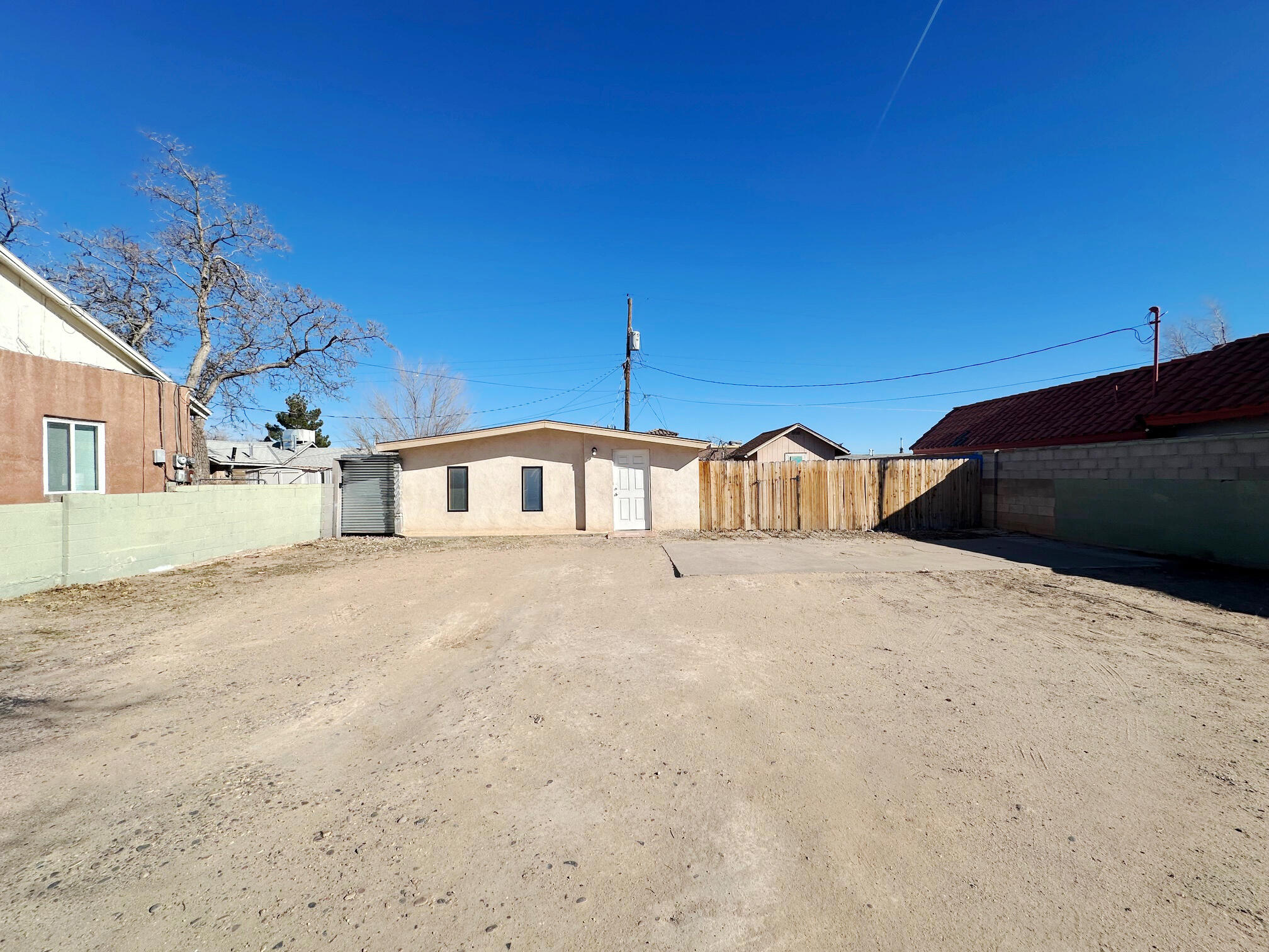 This 2 bedroom, 1 bathroom home is located close to shopping, dining and I-40. There is a shed/workshop for extra storage or hobbies. The front of the lot has plenty of room for parking and outdoor activities.